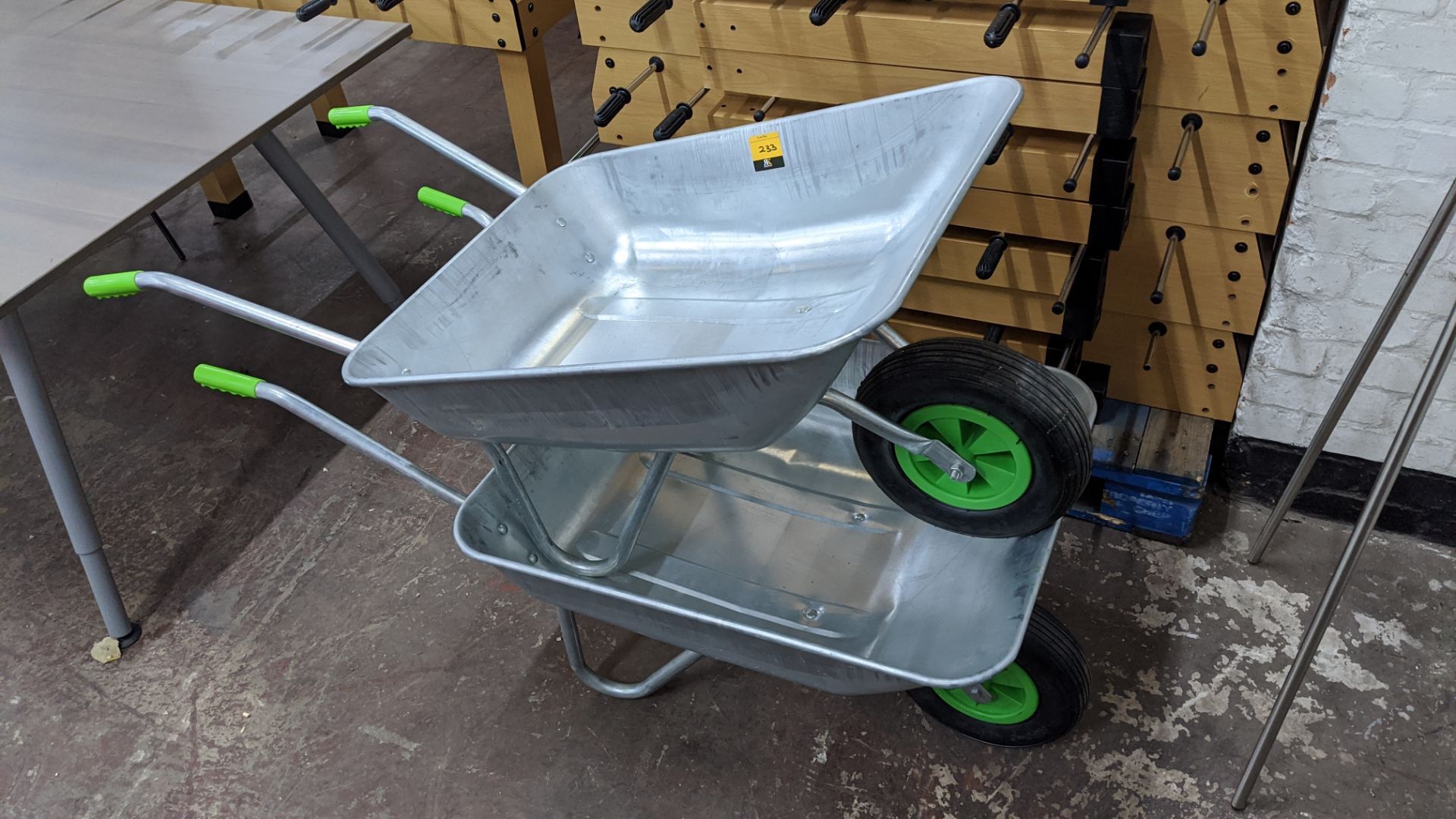 Pair of wheelbarrows. This is one of a number of lots forming the total assets of a conference