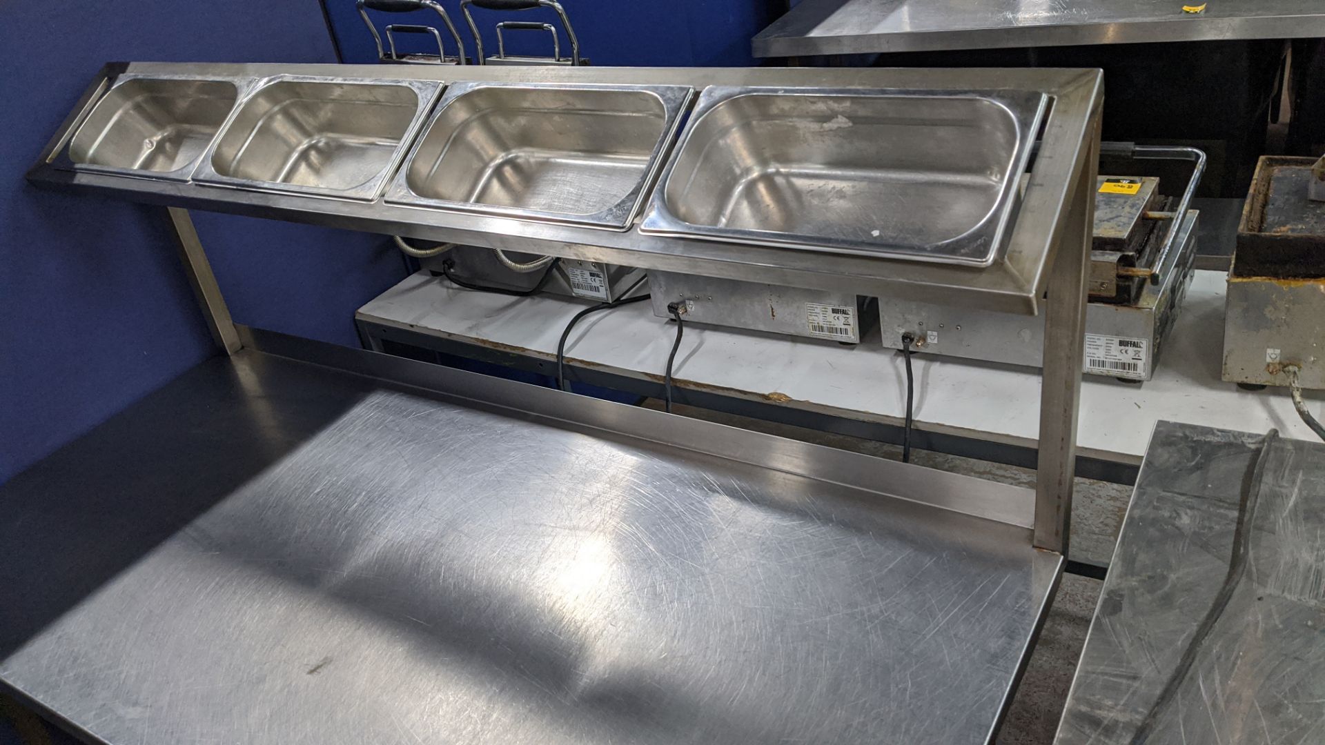 Stainless steel mobile multi tier table with saladette dispensing - 1400mm x 650mm. IMPORTANT: - Image 3 of 4