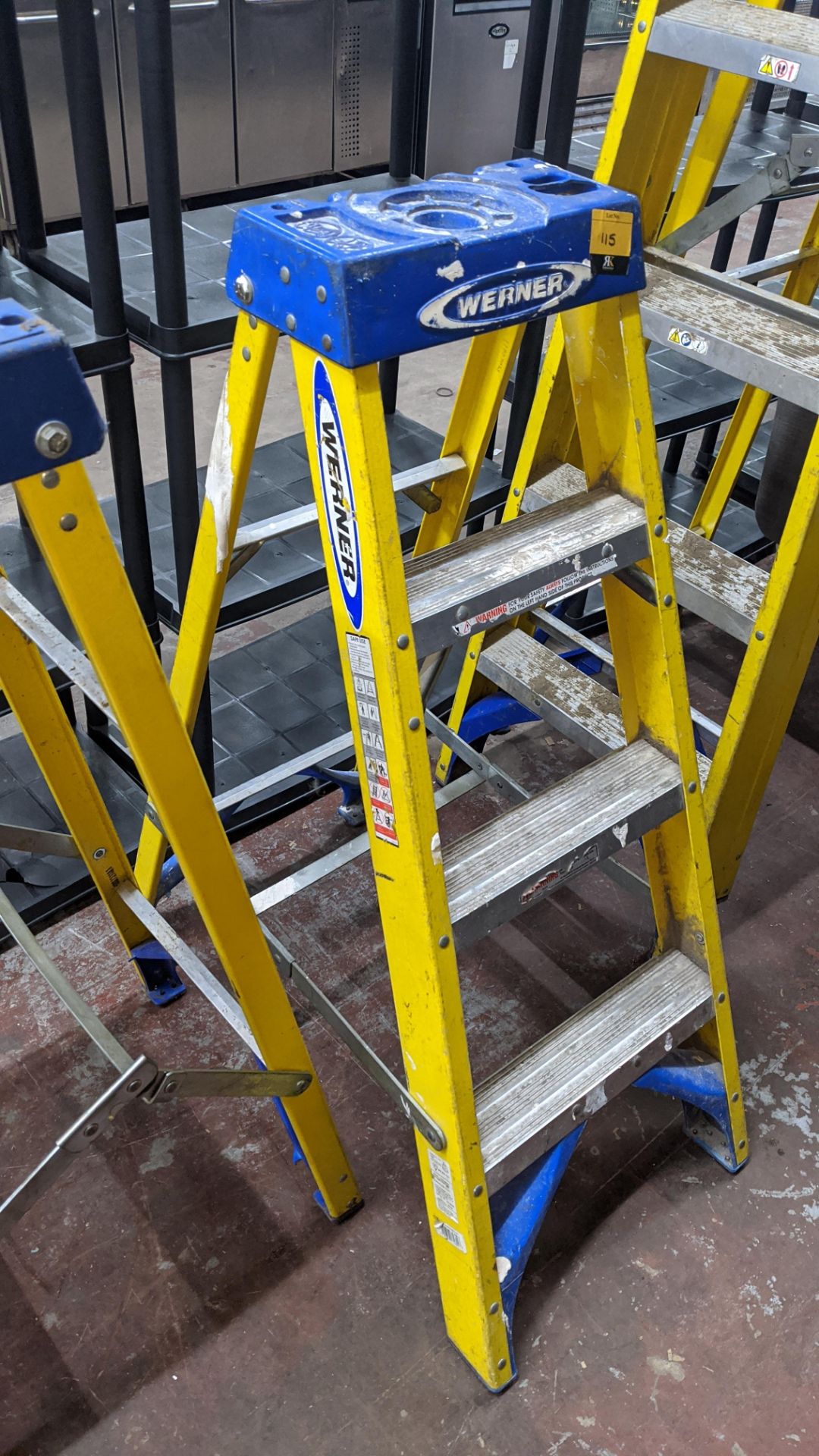 Werner insulated 4 tread folding stepladder. This is one a number of lots being sold on behalf of