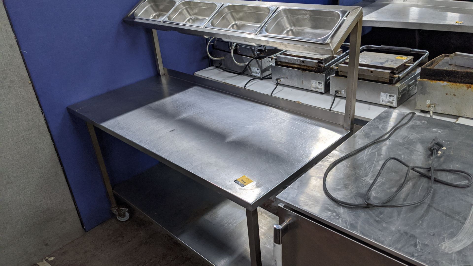 Stainless steel mobile multi tier table with saladette dispensing - 1400mm x 650mm. IMPORTANT: