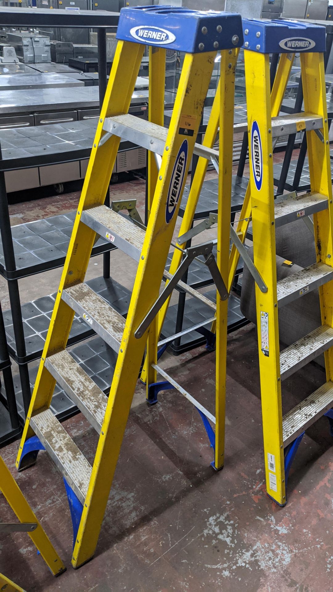 Werner insulated 6 tread folding stepladder. This is one a number of lots being sold on behalf of