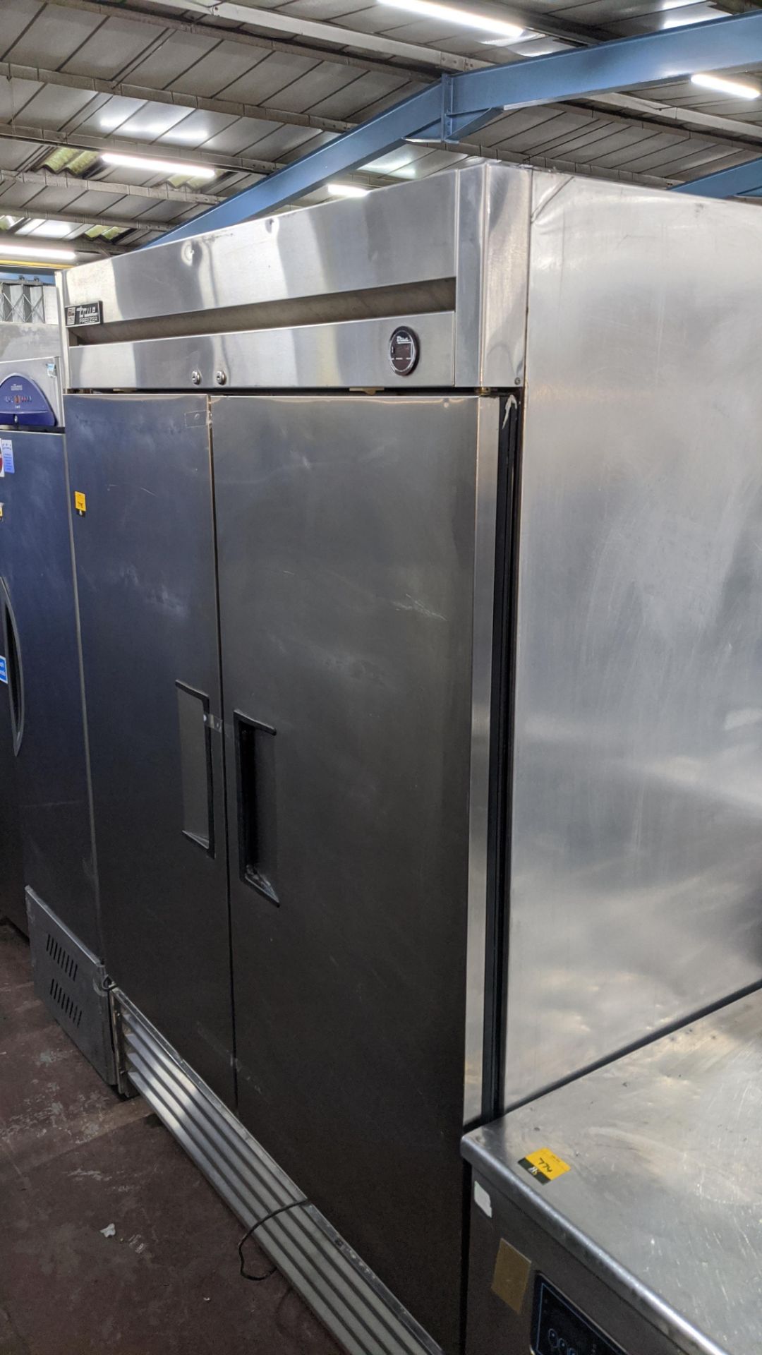 True stainless steel large twin door commercial mobile freezer model T-49FZ. IMPORTANT: Please