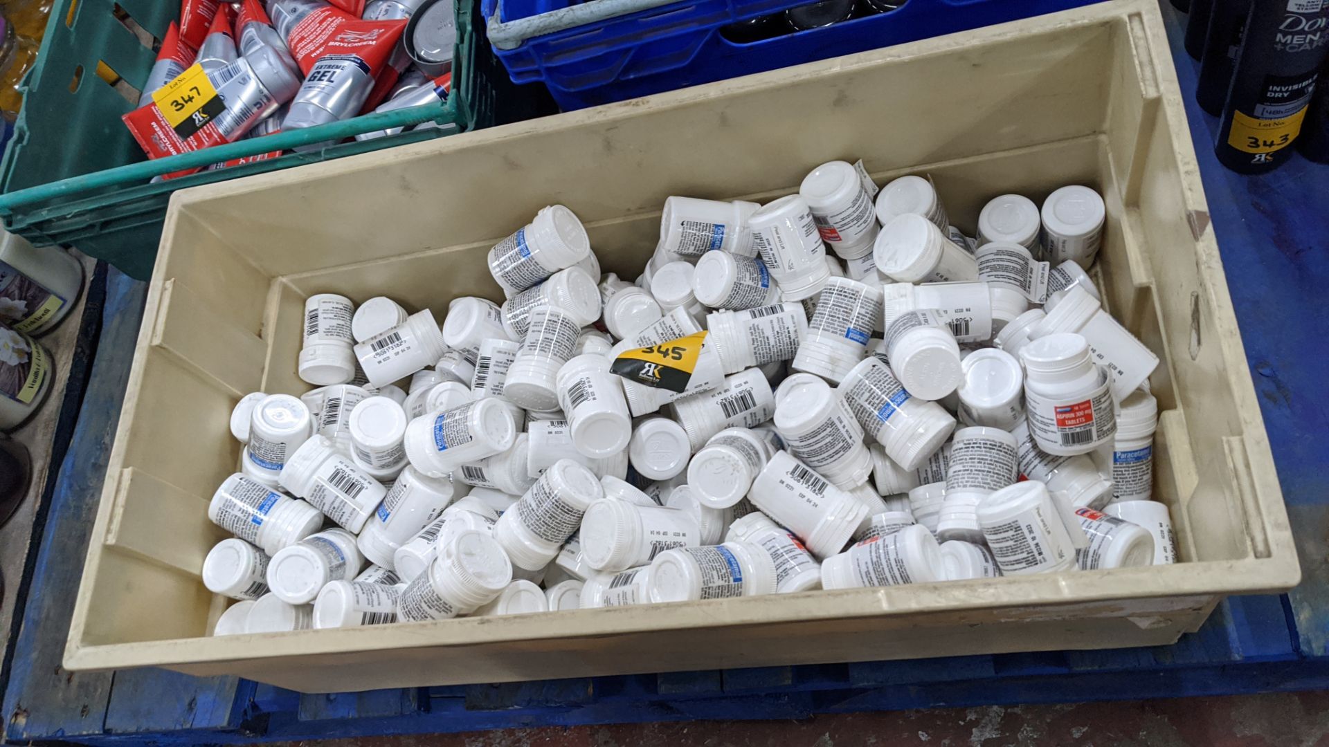 Contents of a crate containing a huge quantity of paracetamol & aspirin - crate excluded.