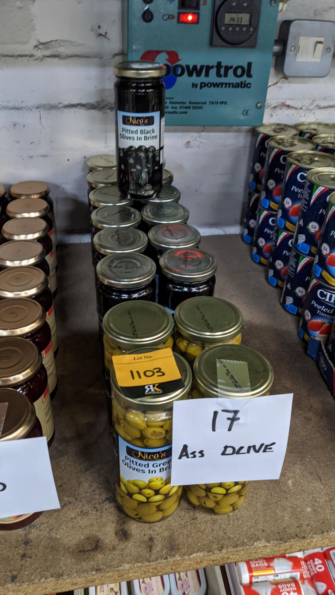 17 jars of assorted green & black pitted olives. IMPORTANT – DO NOT BID BEFORE READING THE IMPORTANT