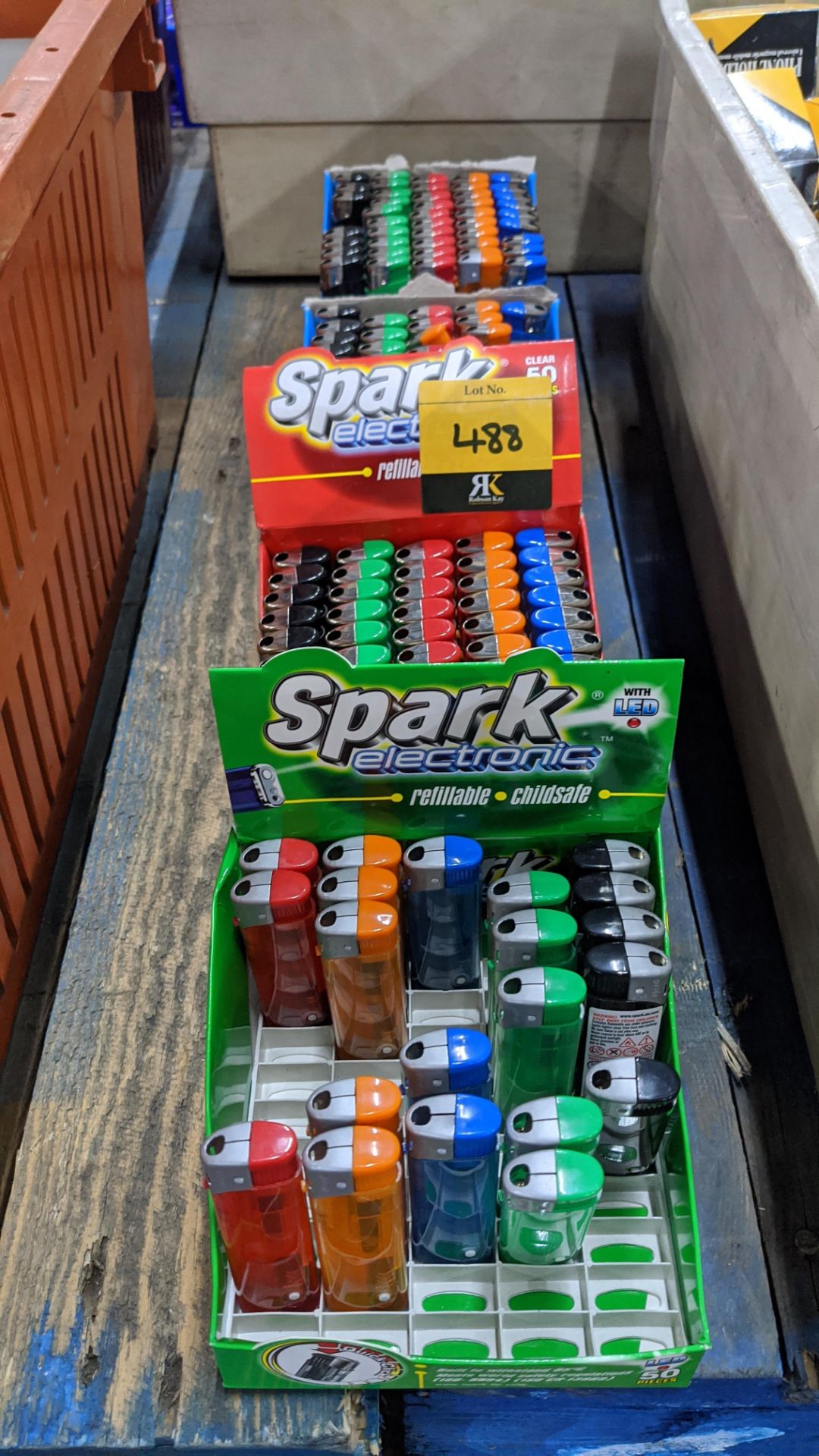 Row of Stark Electronics disposable lighters. IMPORTANT – DO NOT BID BEFORE READING THE IMPORTANT