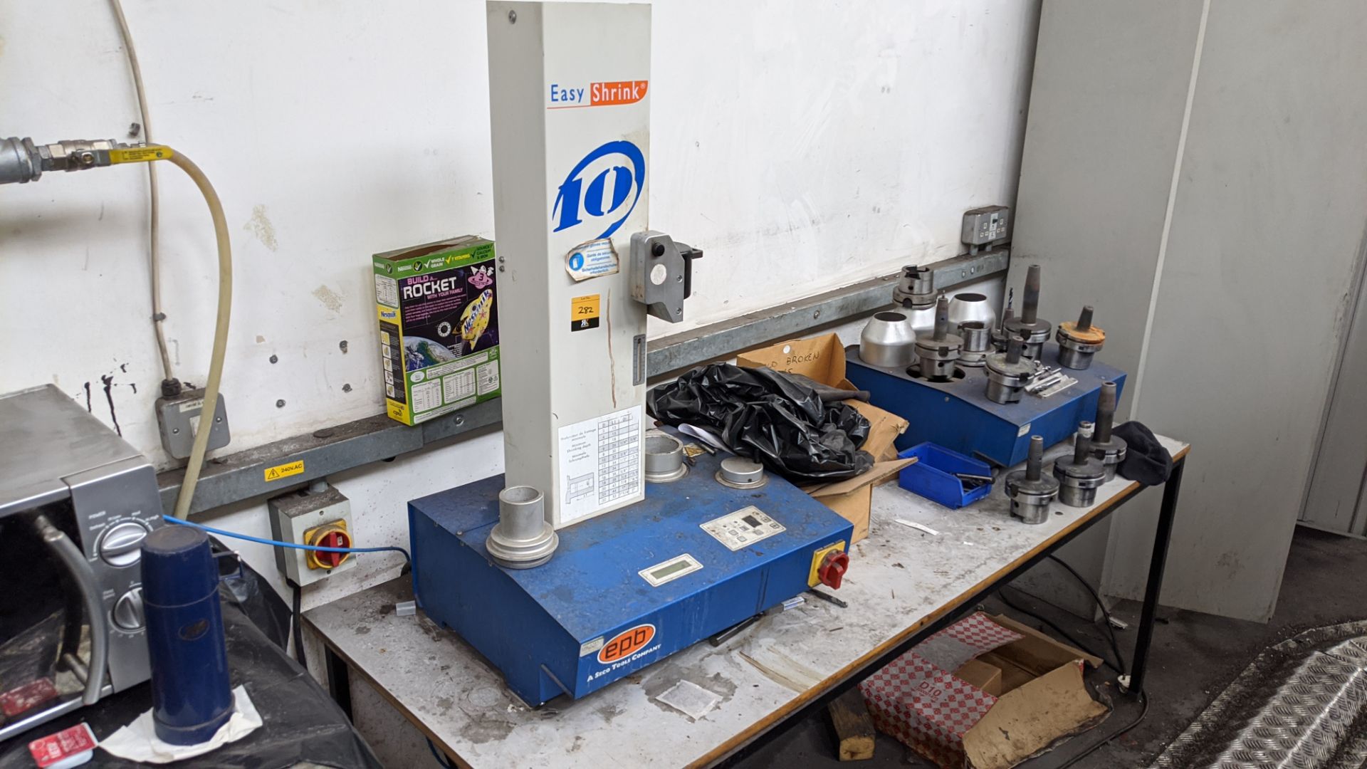 EPB Easy Shrink 10 plus table of tooling & all other items as pictured adjacent to this machine,