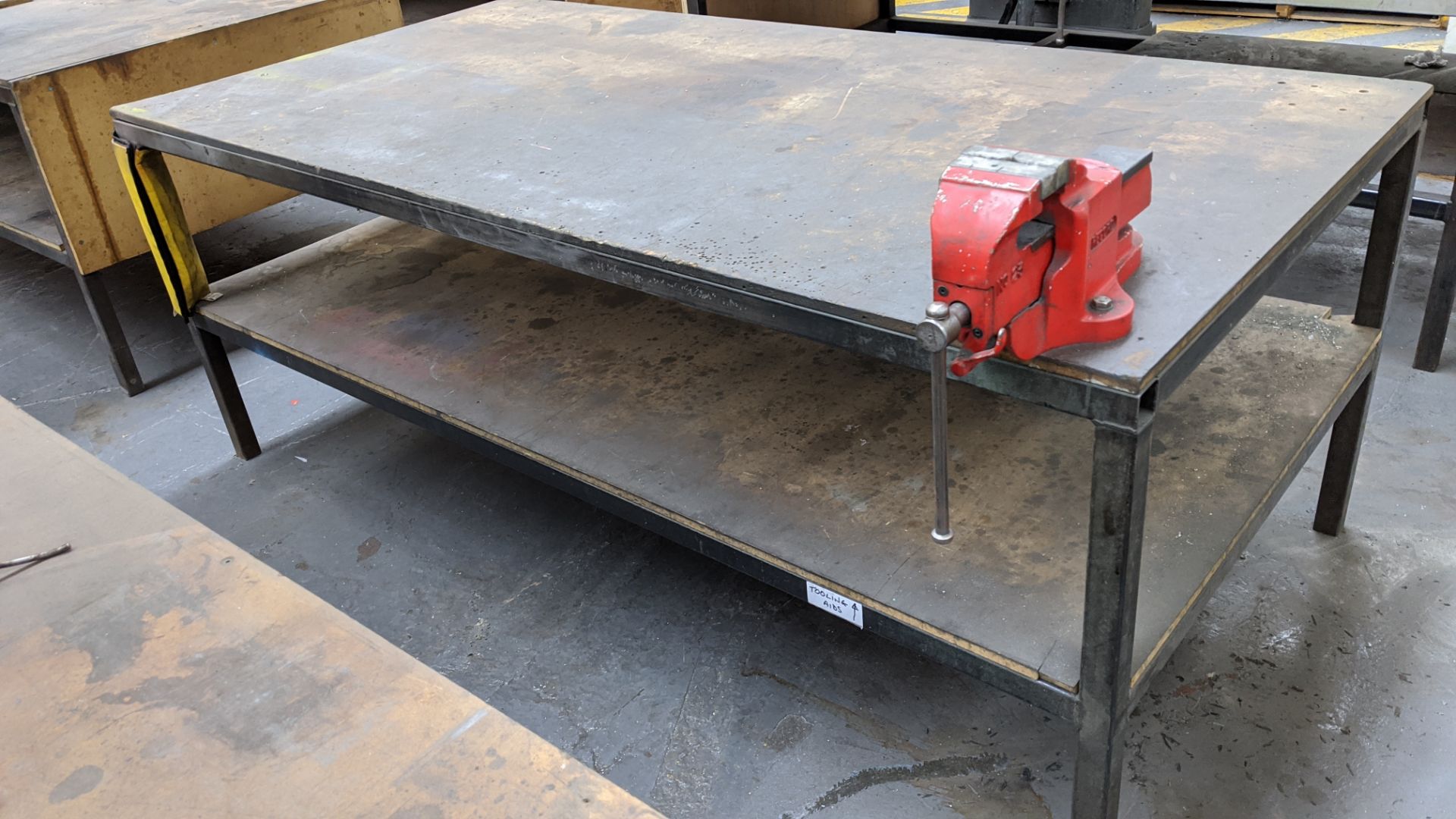 7 off workbenches/tables & contents, of which 6 each include a bolted vice. This lot also includes - Image 8 of 13