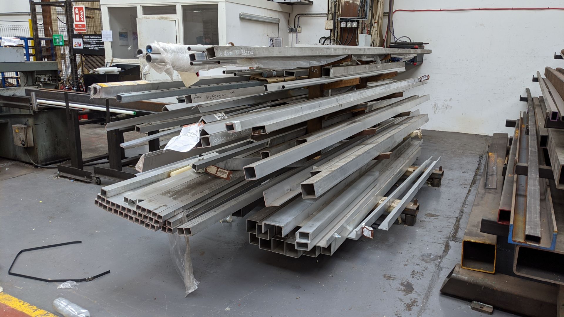 Huge quantity of metal bar, rod & other stock comprising 3 very heavy-duty Christmas tree racks & - Image 6 of 22