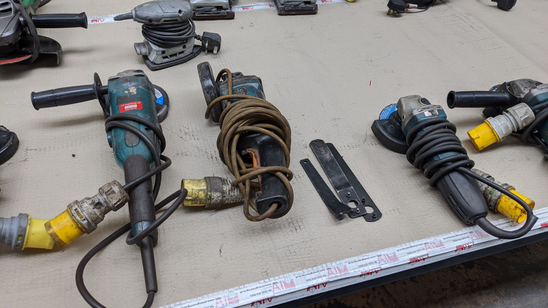 Table & contents of power tools, mostly 110v, including angle grinders, sanders & drills. Approx. 21 - Image 4 of 11