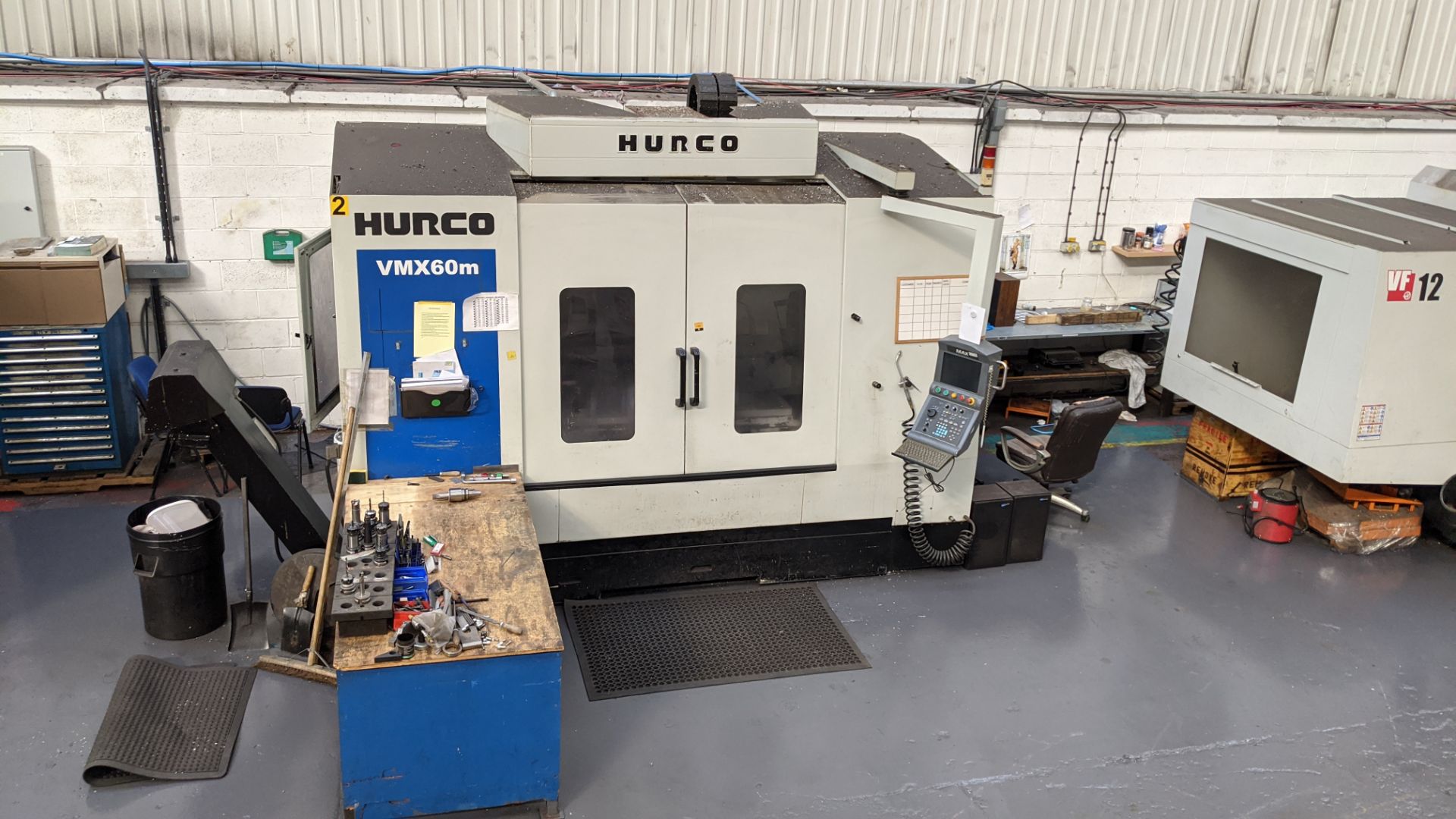 2010 Hurco VMX60m CNC machining centre with Max swing-out controls, serial no. H-S6041. Please