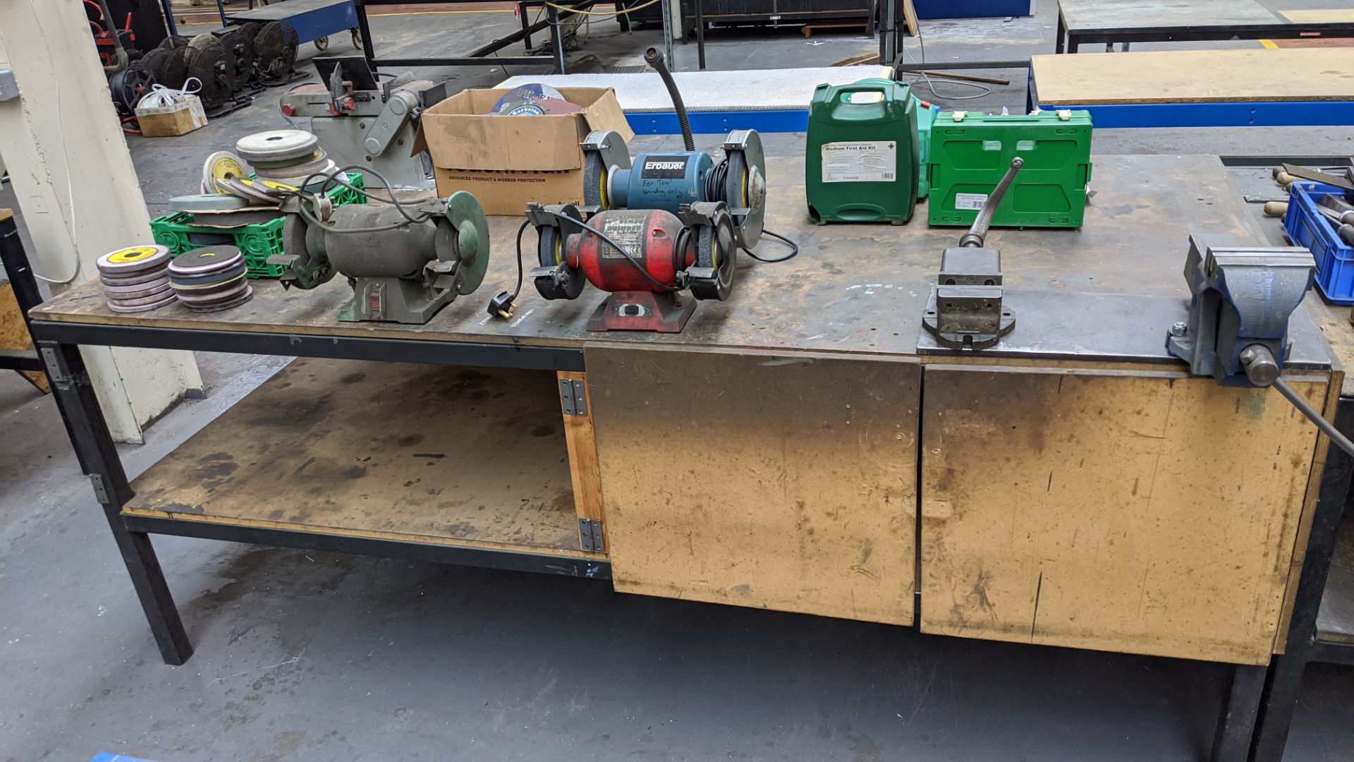 Table & contents including vices, sets of twin grinding wheels, linishing belt, consumables, first