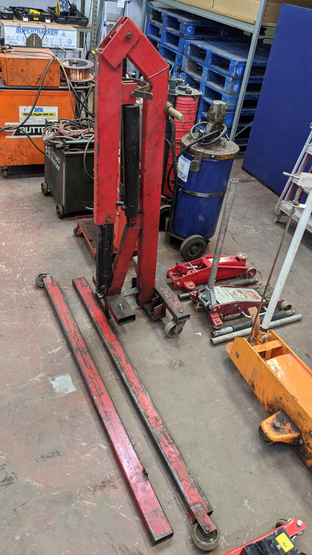 Assorted lifting equipment comprising transmission jack, mobile hoist & trolley with contents. - Image 7 of 12