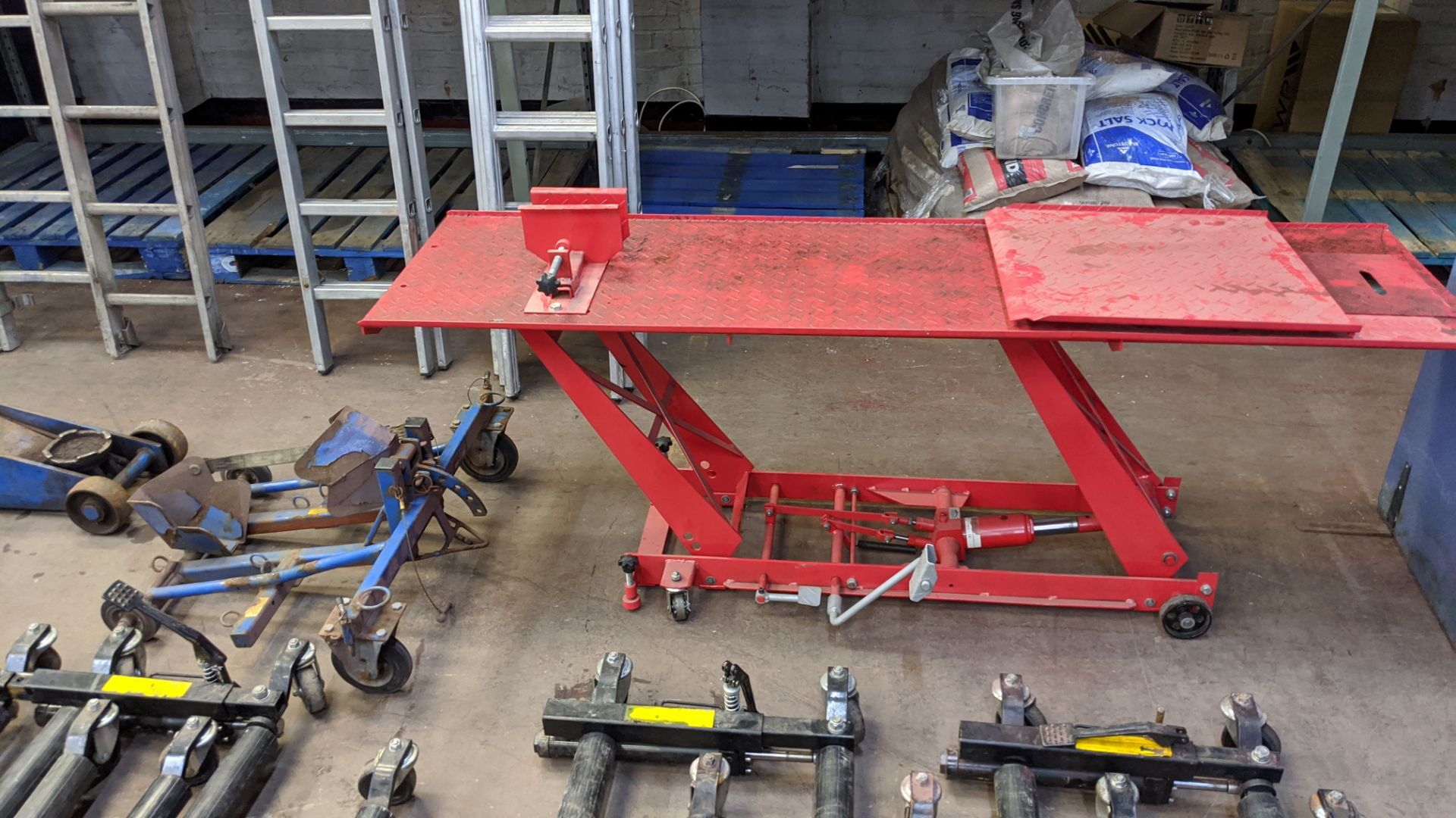 Motorbike lifting platform, 1000lb/454kg capacity plus wheel clamp trolley. Lots 22 - 53 are all