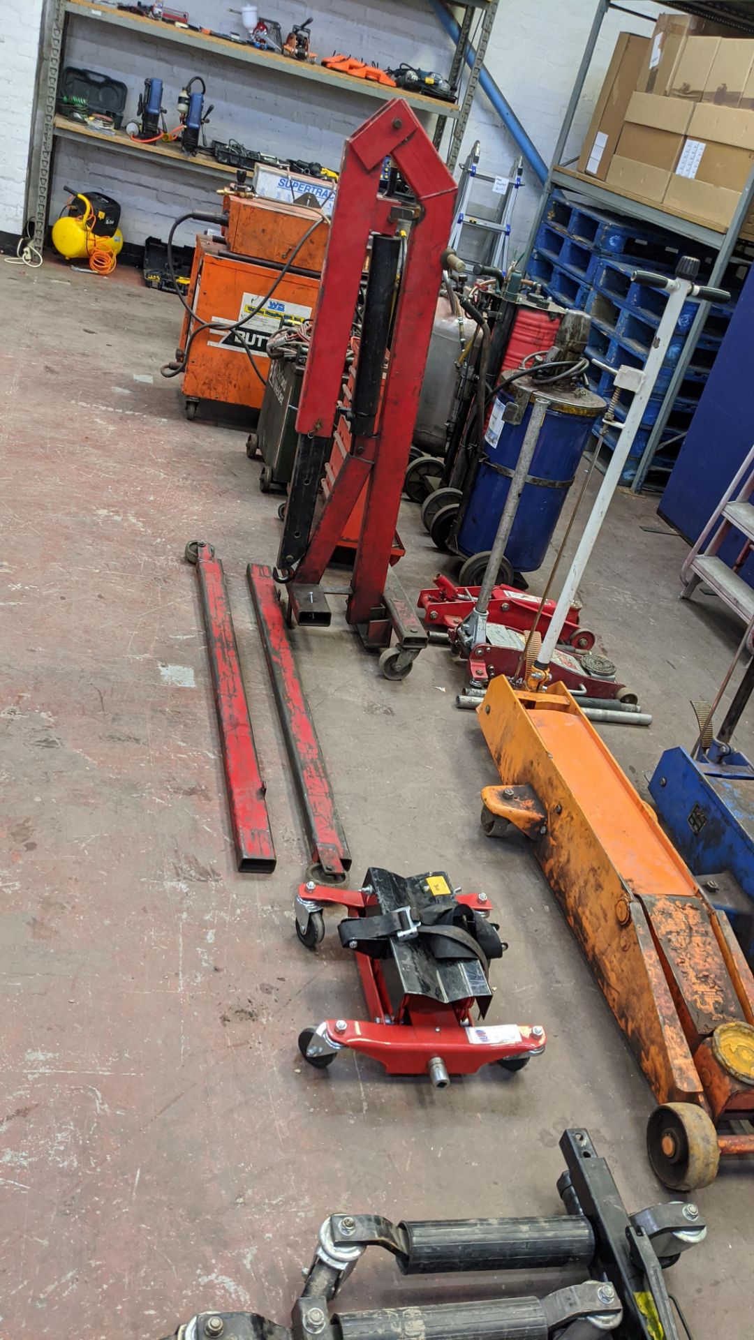 Assorted lifting equipment comprising transmission jack, mobile hoist & trolley with contents. - Image 2 of 12