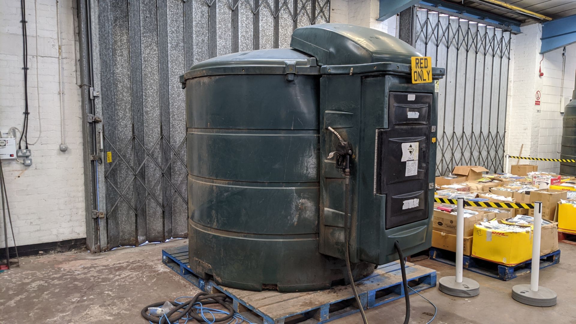 Large bunded diesel tank with electric pump, estimated 5,000 litre capacity (no label/plaque),