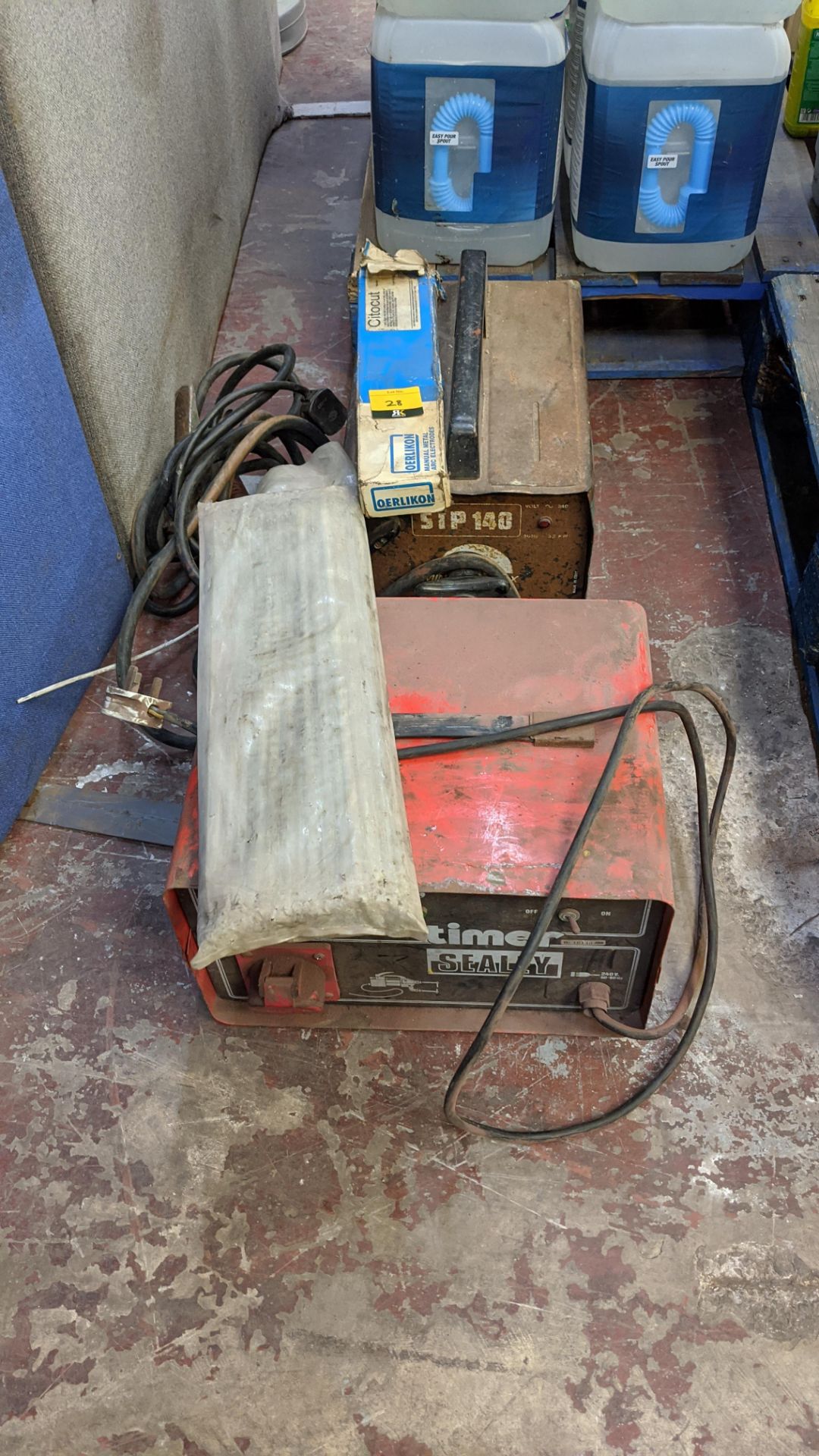 Pair of small assorted welders plus quantity of consumables. Lots 22 - 53 are all located inside our