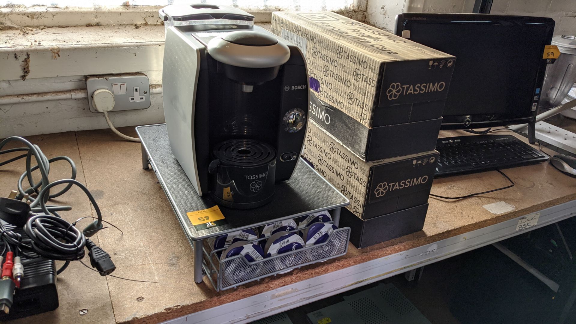 Bosch Tassimo coffee machine, including stand & quantity of Cadburys chocolate inserts plus 2