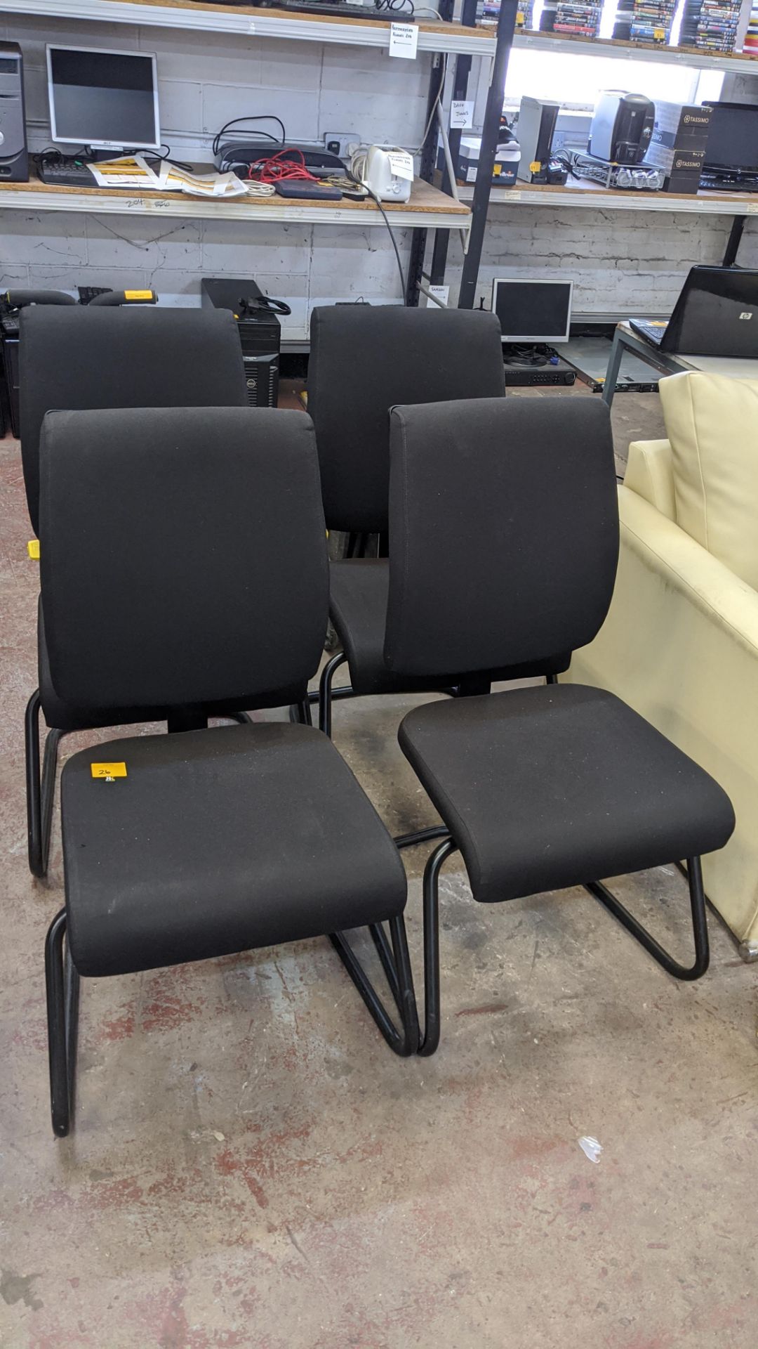 4 off black upholstered cantilever frame visitor's chairs. IMPORTANT: This auction is strictly