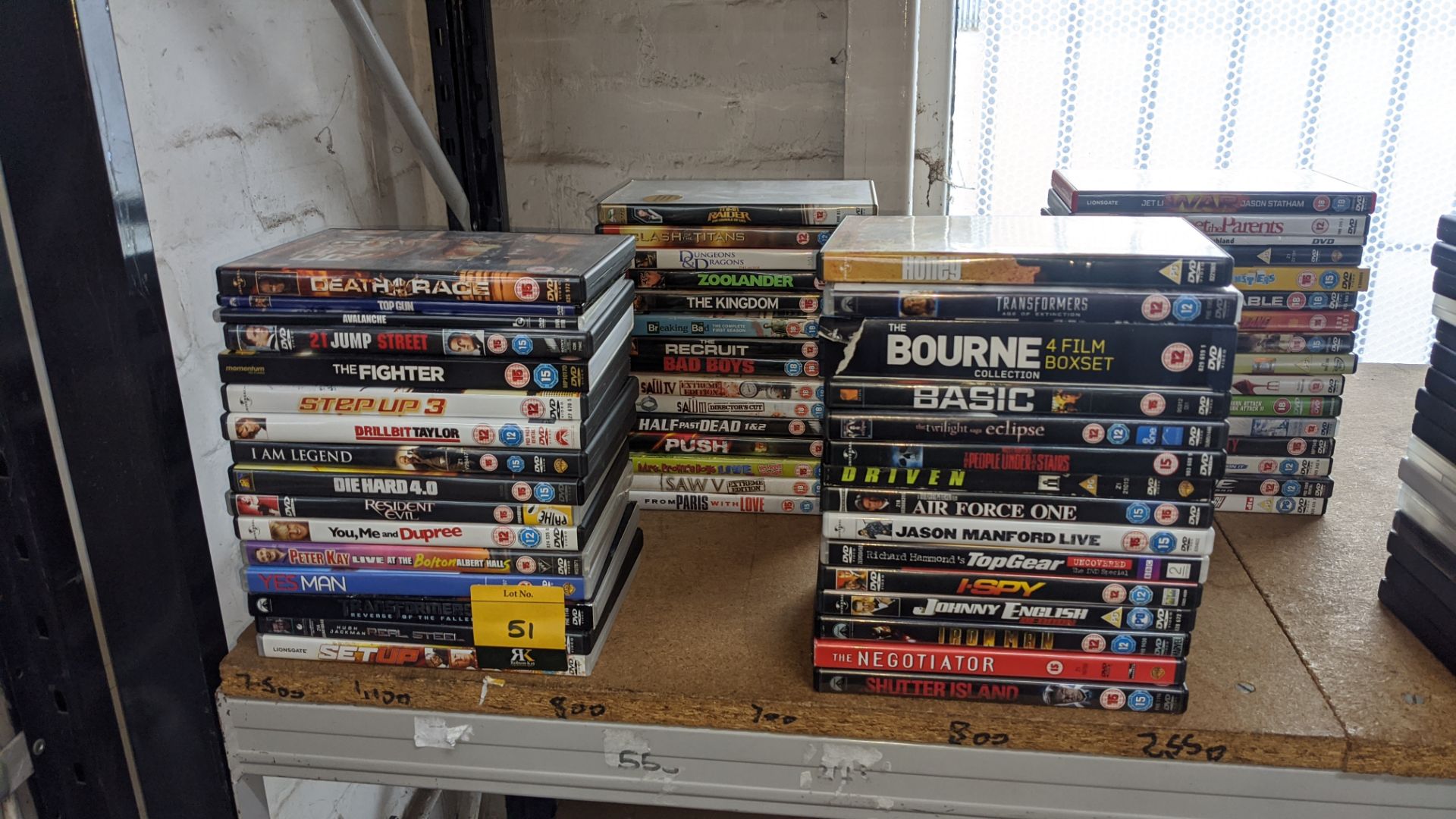 Approximately 62 off assorted DVDs. IMPORTANT: This auction is strictly subject to a two day payment