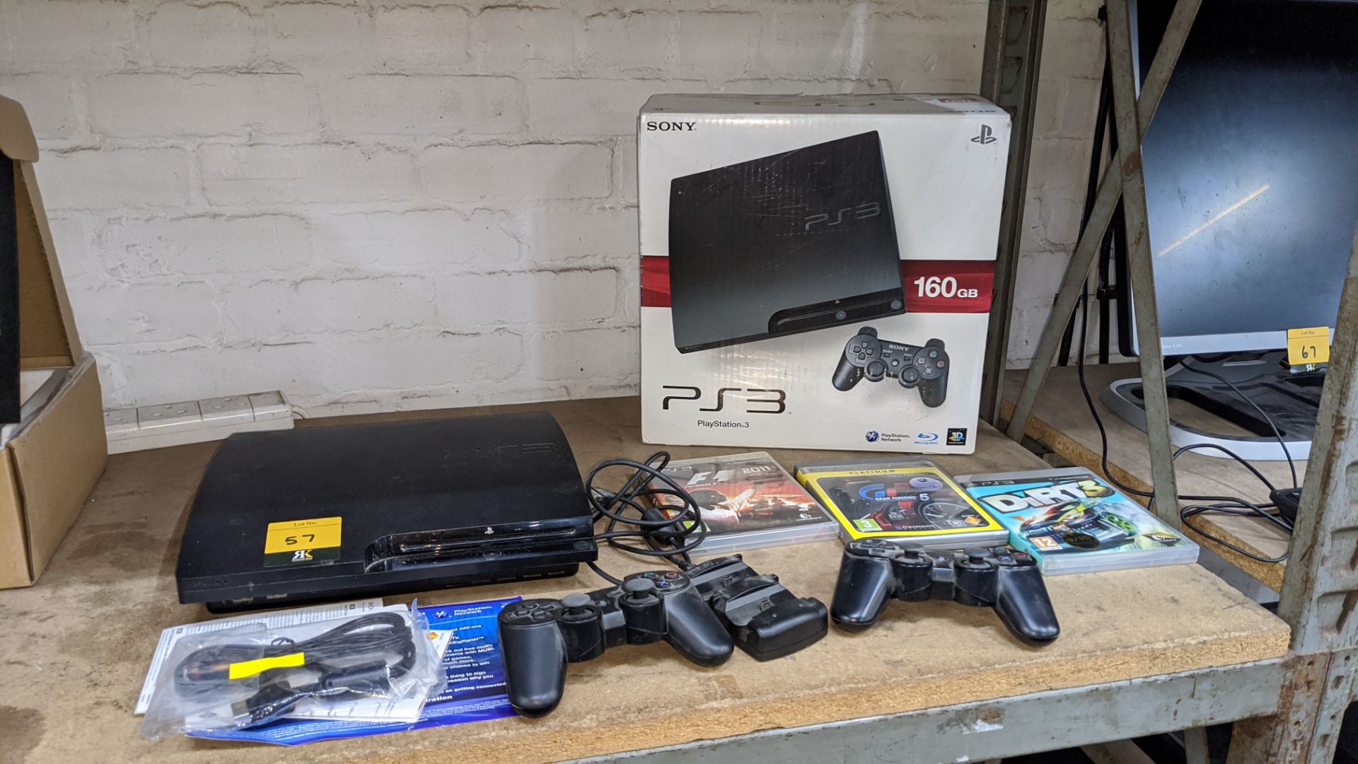 Sony PS3 gaming console, 160Gb, including 2 off Dual Shock 3 SIXAXIS wireless controllers and dock - Image 3 of 11