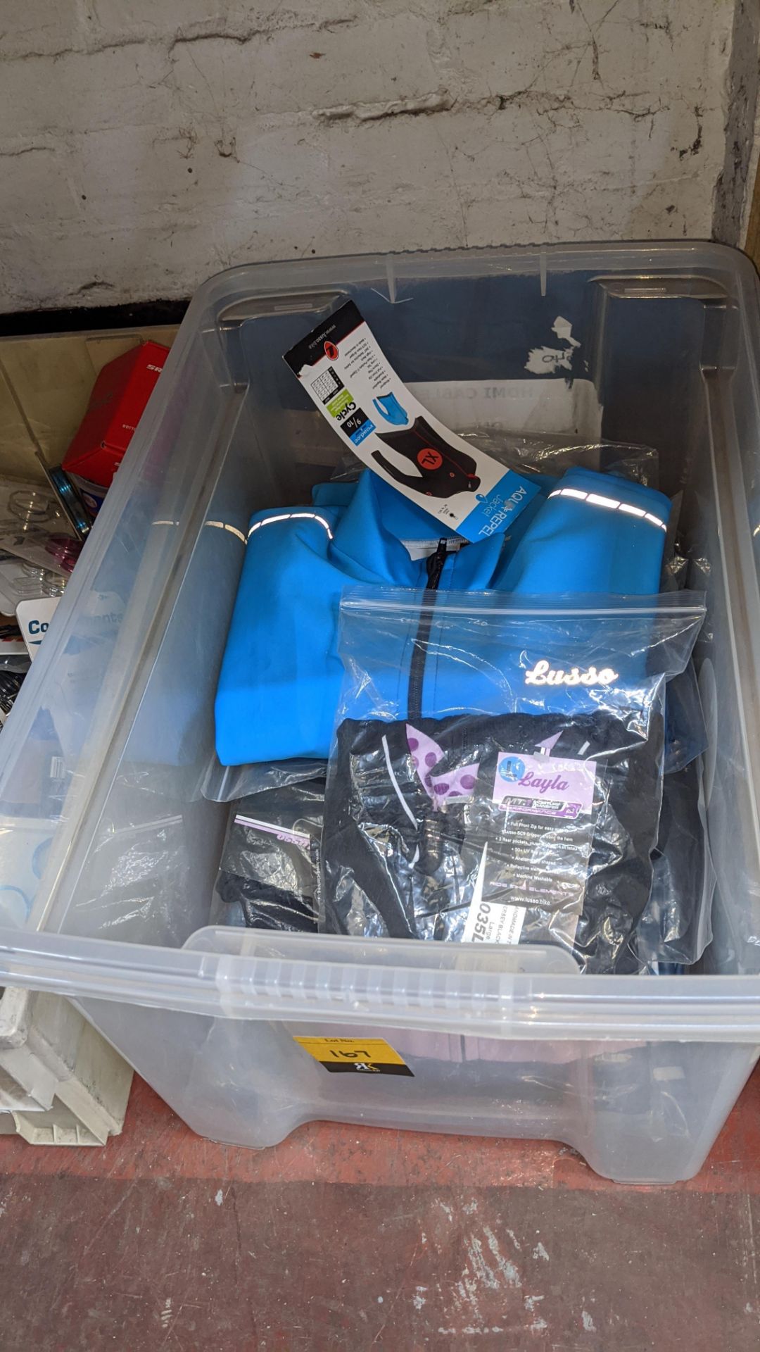 Contents of a crate of cycle related clothing - crate excludedLots 101 - 285 Are being sold on