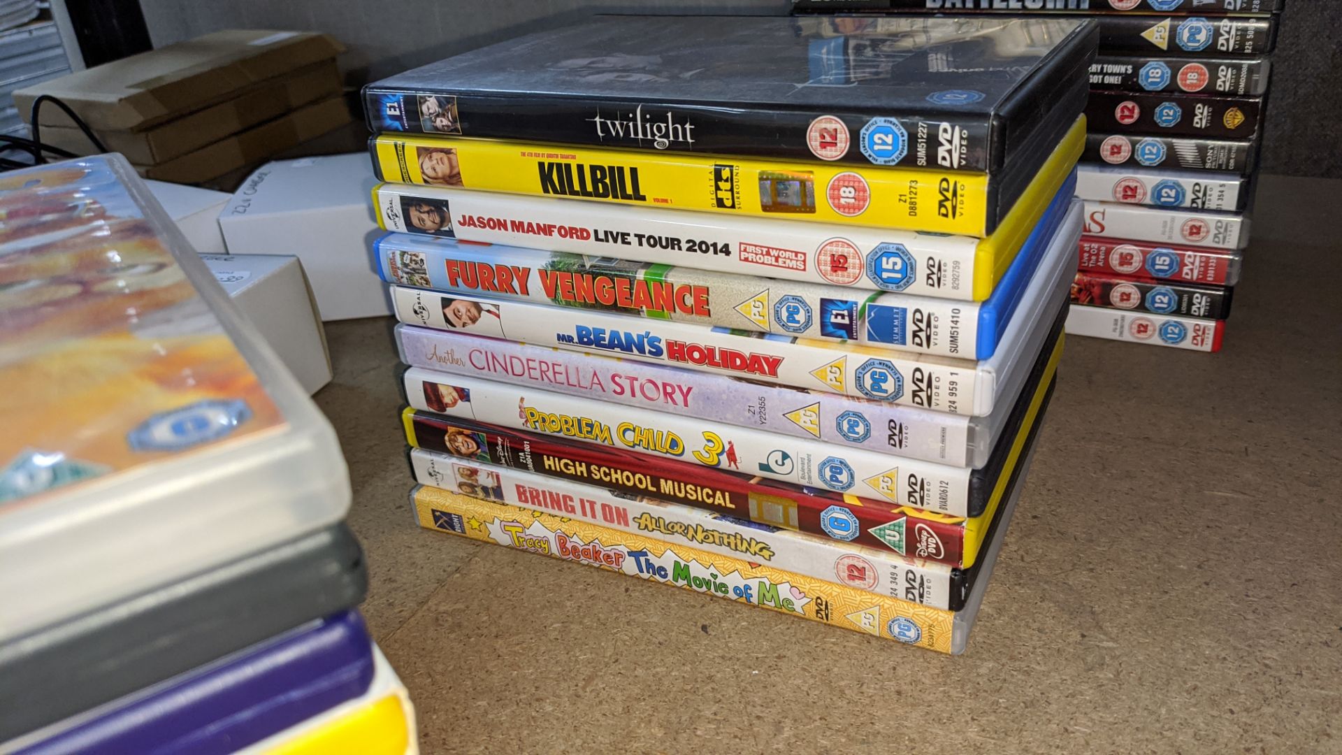 Mixed lot comprising approximately 30 assorted DVDs plus 3 off gaming steering wheel and pedal - Image 4 of 8