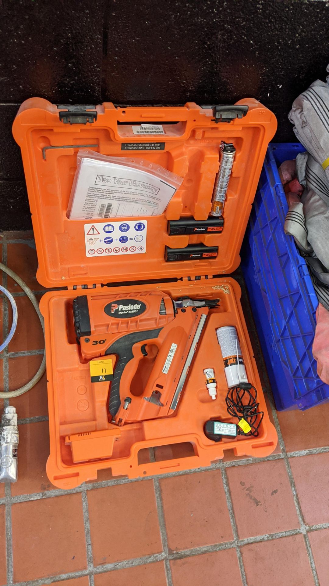 Paslode Impulse IM350+ nail gun in case with various accessories as pictured including charger &