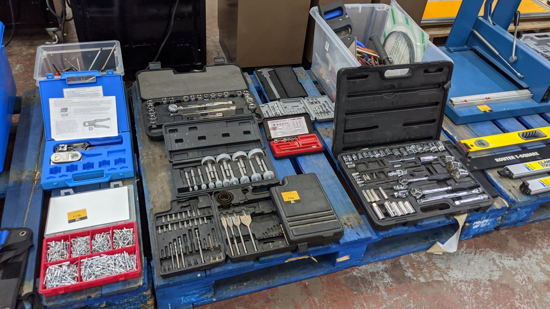 The contents of a pallet comprising a quantity of assorted socket sets, bit sets, hand tools &