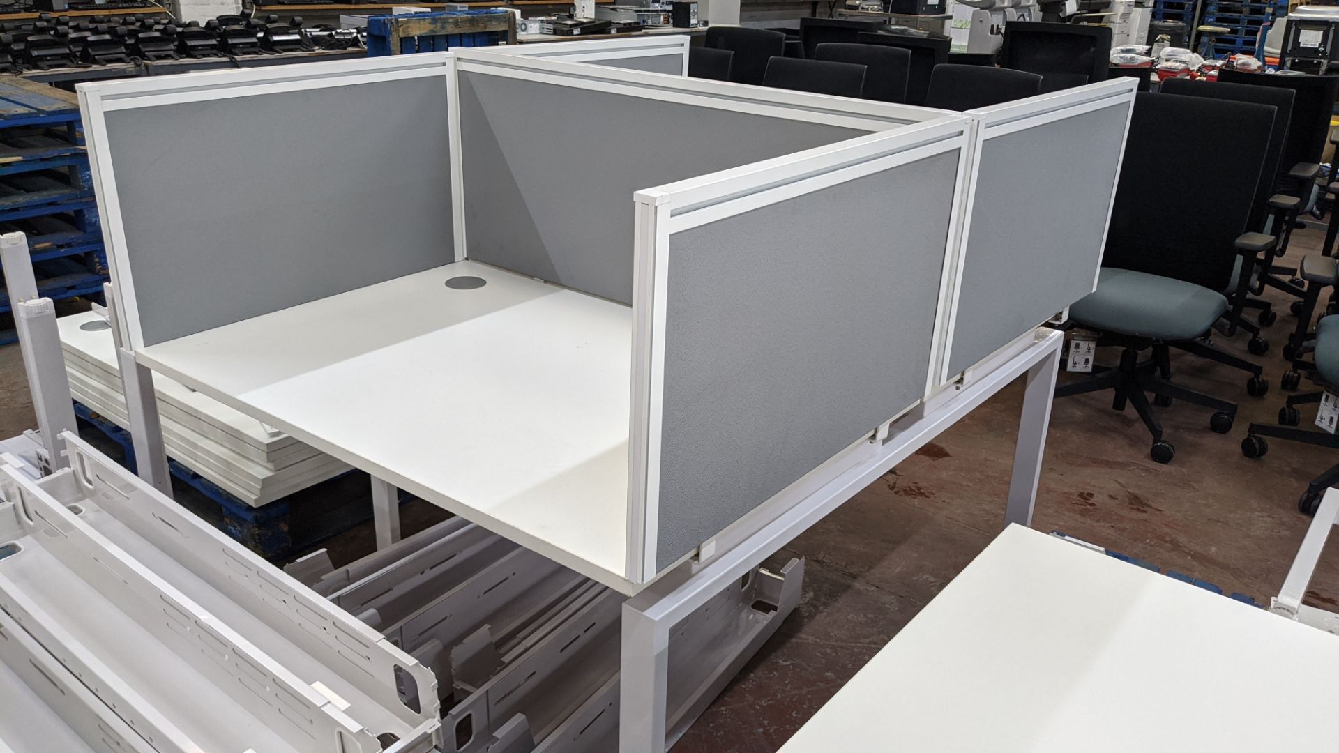 Large 10-person workstation with low height screens surrounding each workspace. Please see the "sis - Image 10 of 10