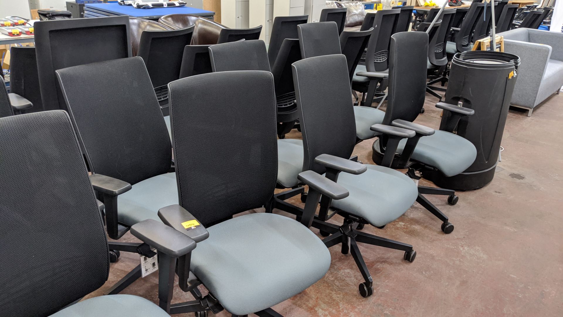 6 off Edge Design modern office chairs with arms, incorporating green/grey fabric seat bases & black