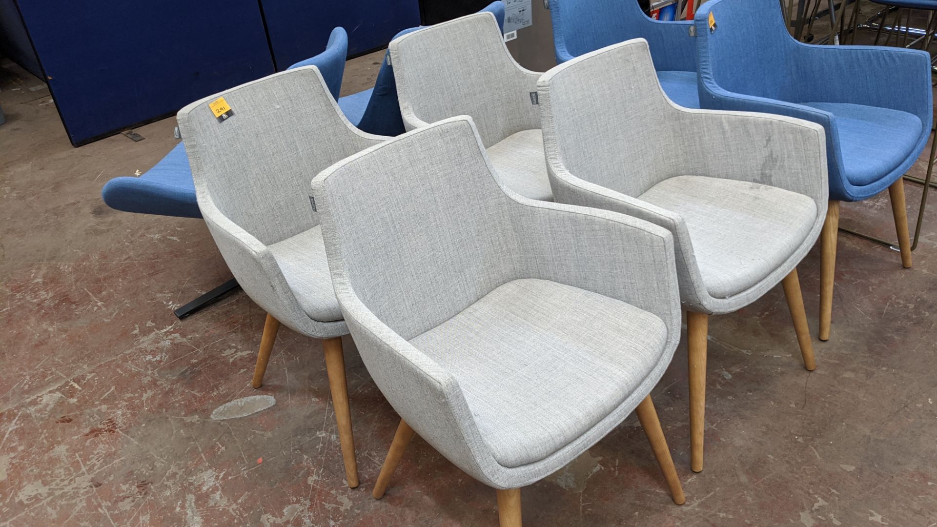 4 off Identity pale grey upholstered armchairs on wooden legs NB. The chair designs for lot 291 & 2