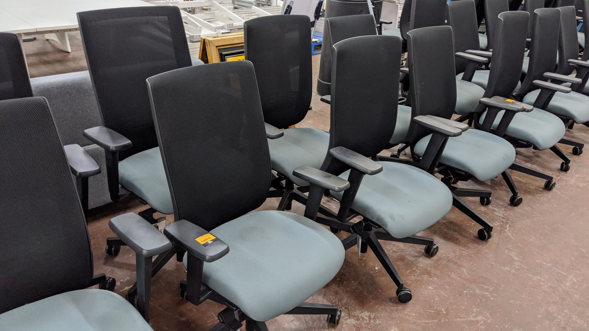 6 off Edge Design modern office chairs with arms, incorporating green/grey fabric seat bases & black