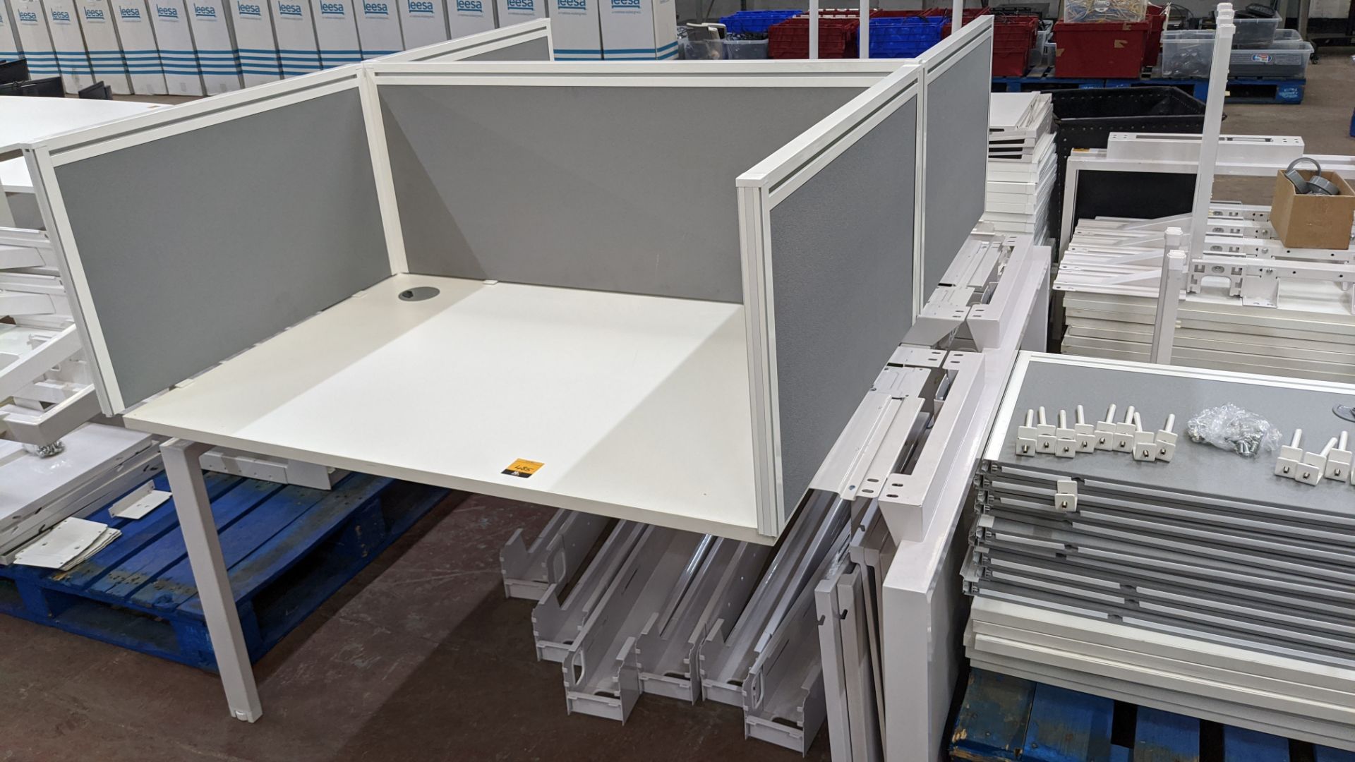 Large 8-person workstation with low height screens surrounding each workspace. We have partially re - Image 4 of 8