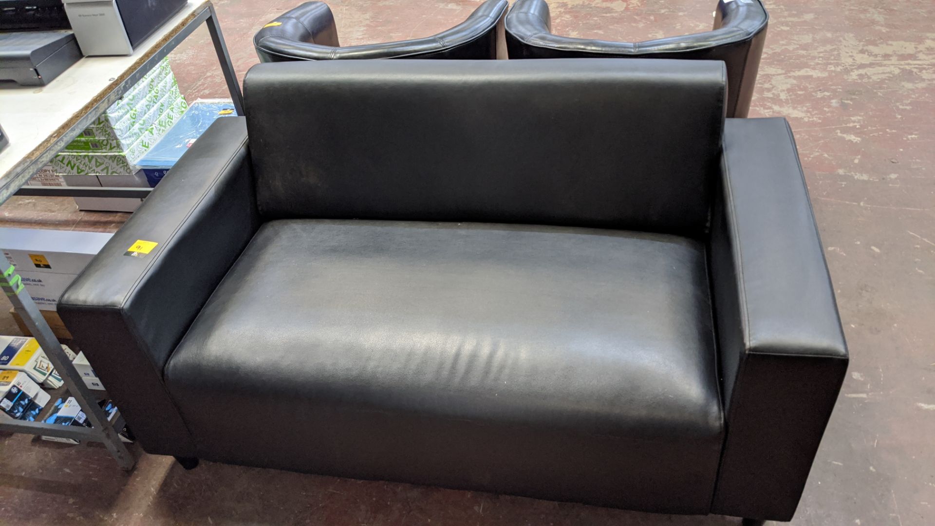 Small black leather/leather look sofa