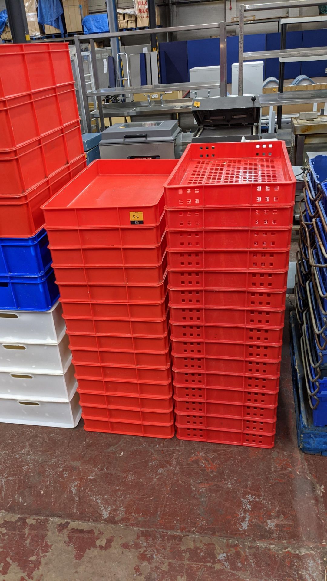 29 off red plastic stacking crates, each measuring 460mm x 760mm x 80mm, in 2 styles, one with holes