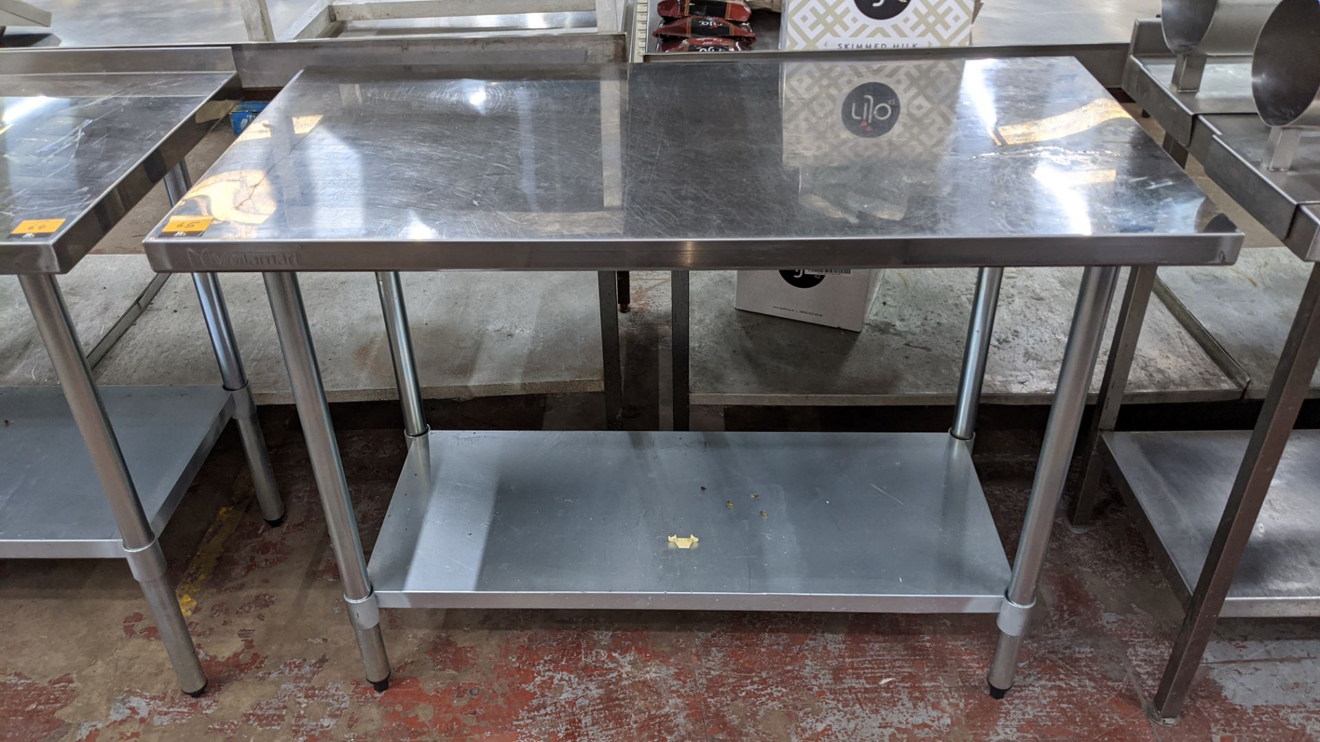 Stainless steel twin tier table, top measuring approximately 1220mm x 610mm - Image 3 of 3