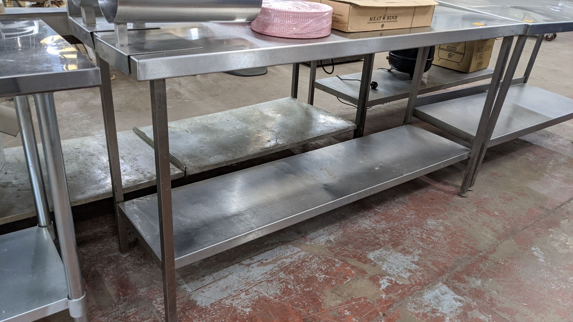 Stainless steel twin tier table with top measuring approximately 1790mm x 600mm - Image 3 of 3