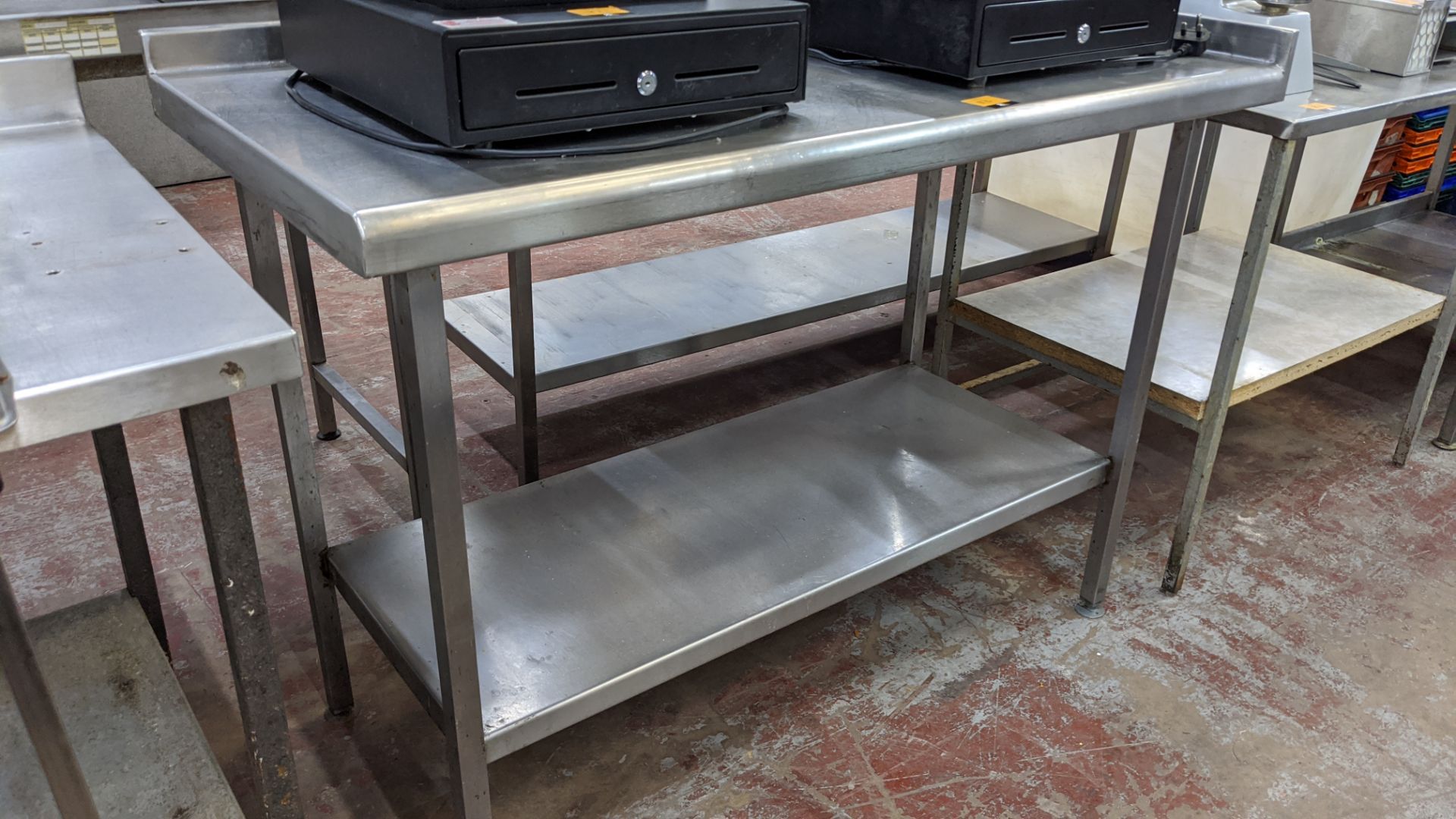 Stainless steel twin tier table measuring approximately 1300mm x 645mm x 950mm - Image 2 of 3