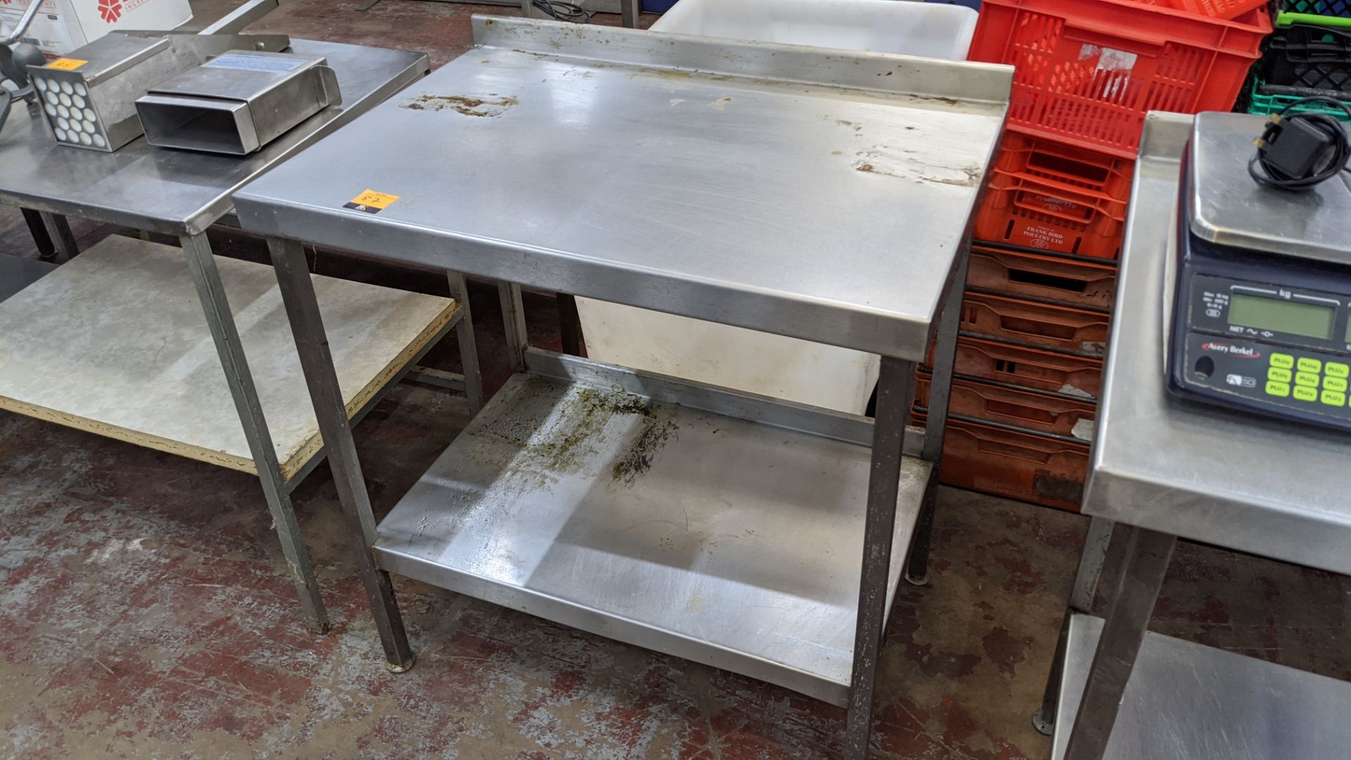 Stainless steel twin tier table with dimensions of 860mm x 600mm - Image 2 of 3