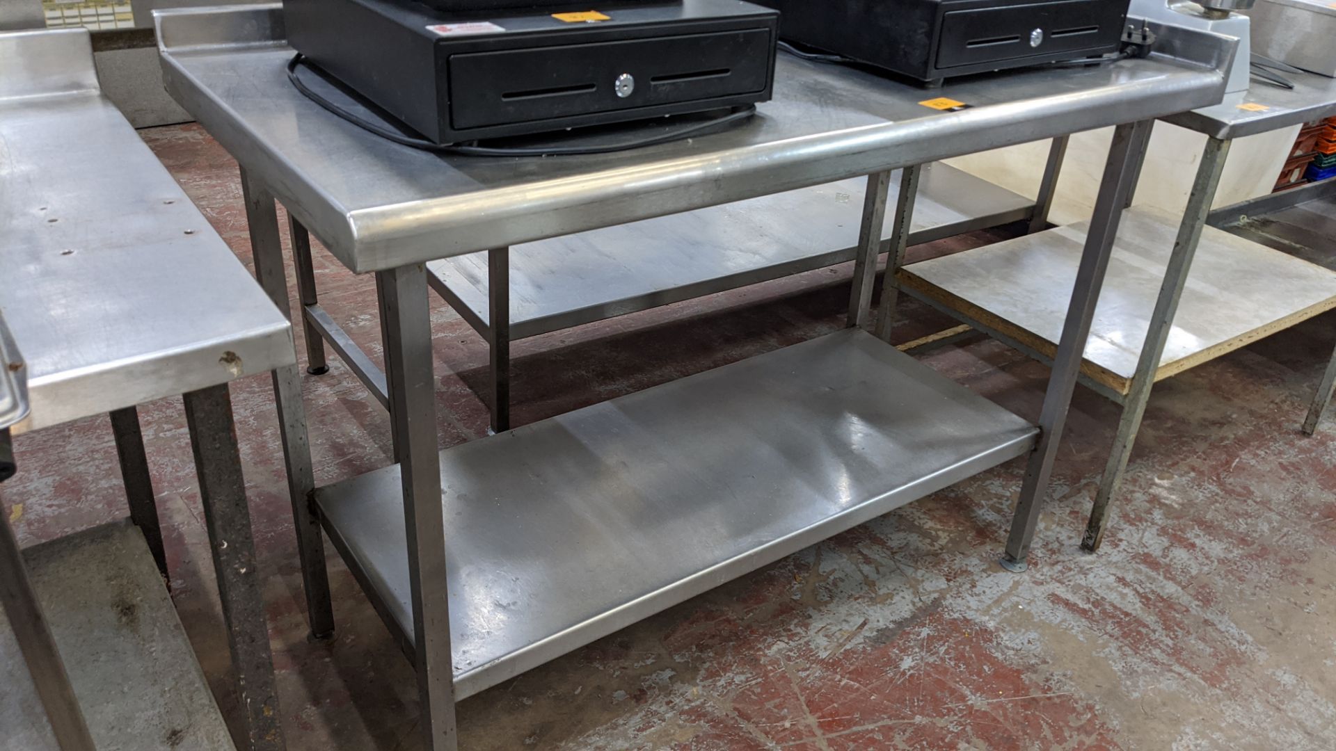 Stainless steel twin tier table measuring approximately 1300mm x 645mm x 950mm