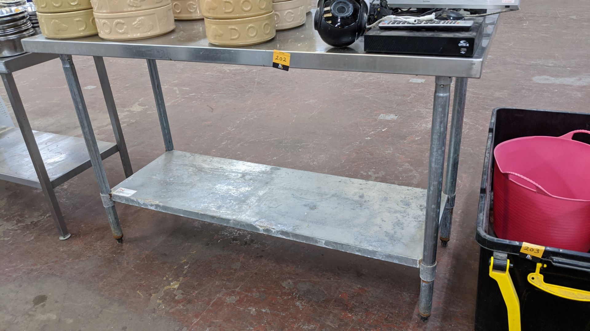 Twin tier stainless steel table measuring approximately 60" length, 24" depth, 36" height - Image 2 of 3