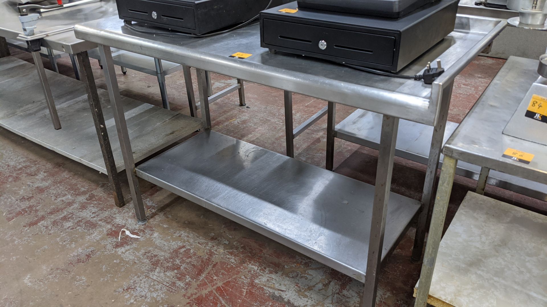 Stainless steel twin tier table measuring approximately 1300mm x 645mm x 950mm - Image 3 of 3