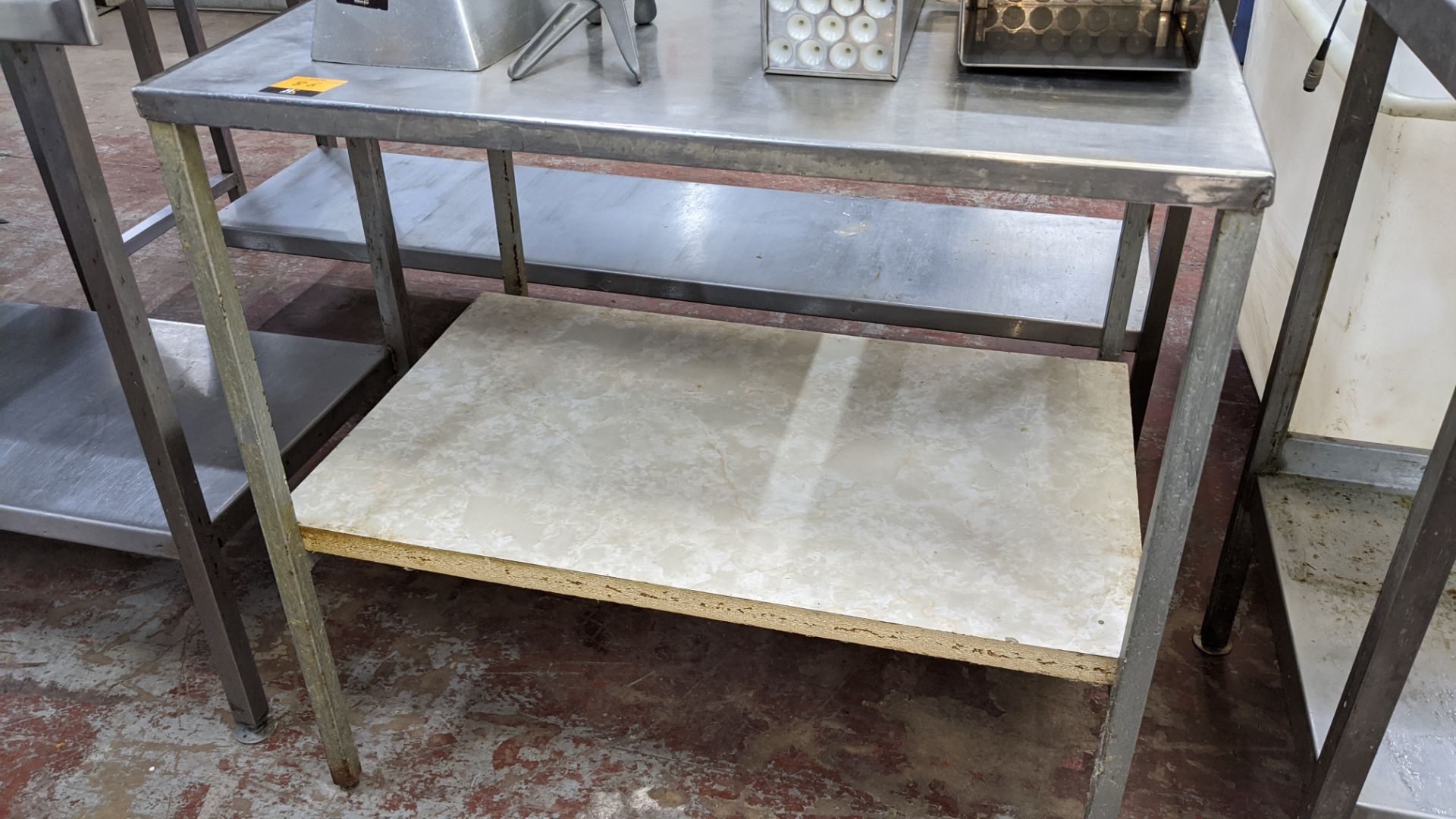 Stainless steel twin tier table with dimensions of 845mm x 615mm