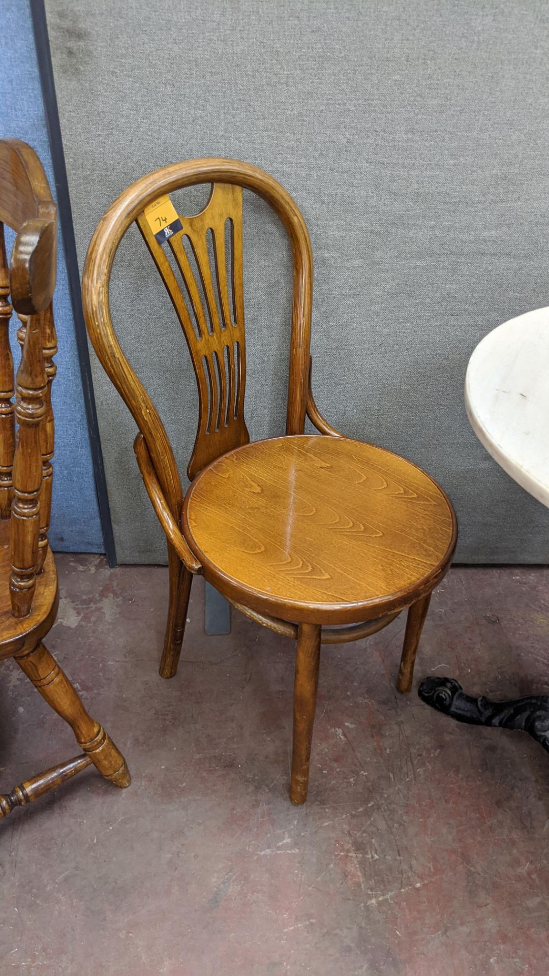 23 off matching wooden dining/café chairs NB. The chairs in lot 75 have the same frame as those in