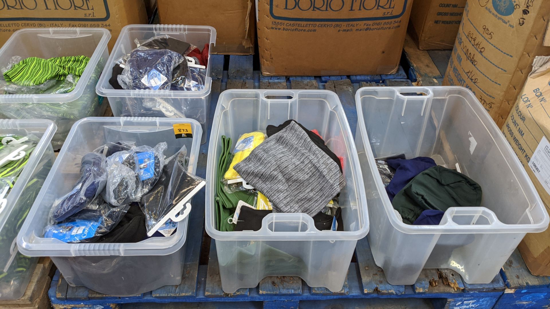 The contents of 4 crates of assorted hats, snoods & other products - crates excluded