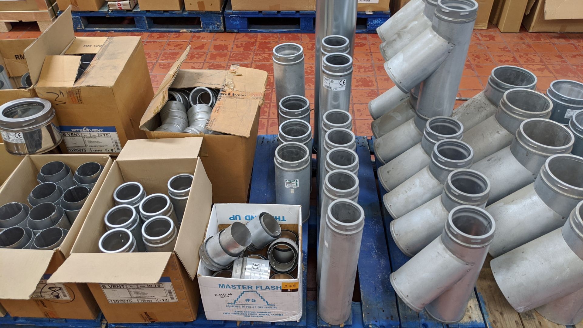 The contents of a pallet of Schiedel pipe, connectors & other chimney components