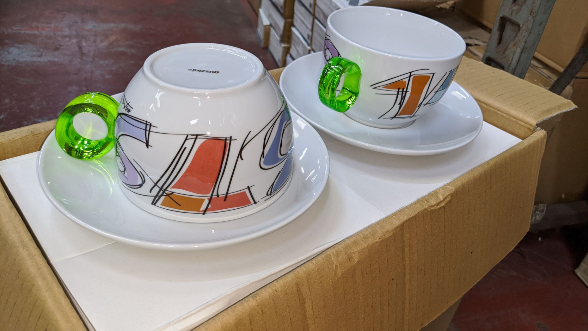 24 off Guzzini porcelain cups & saucers, with green clear handles, boxed in pairs, this lot consists - Image 3 of 4