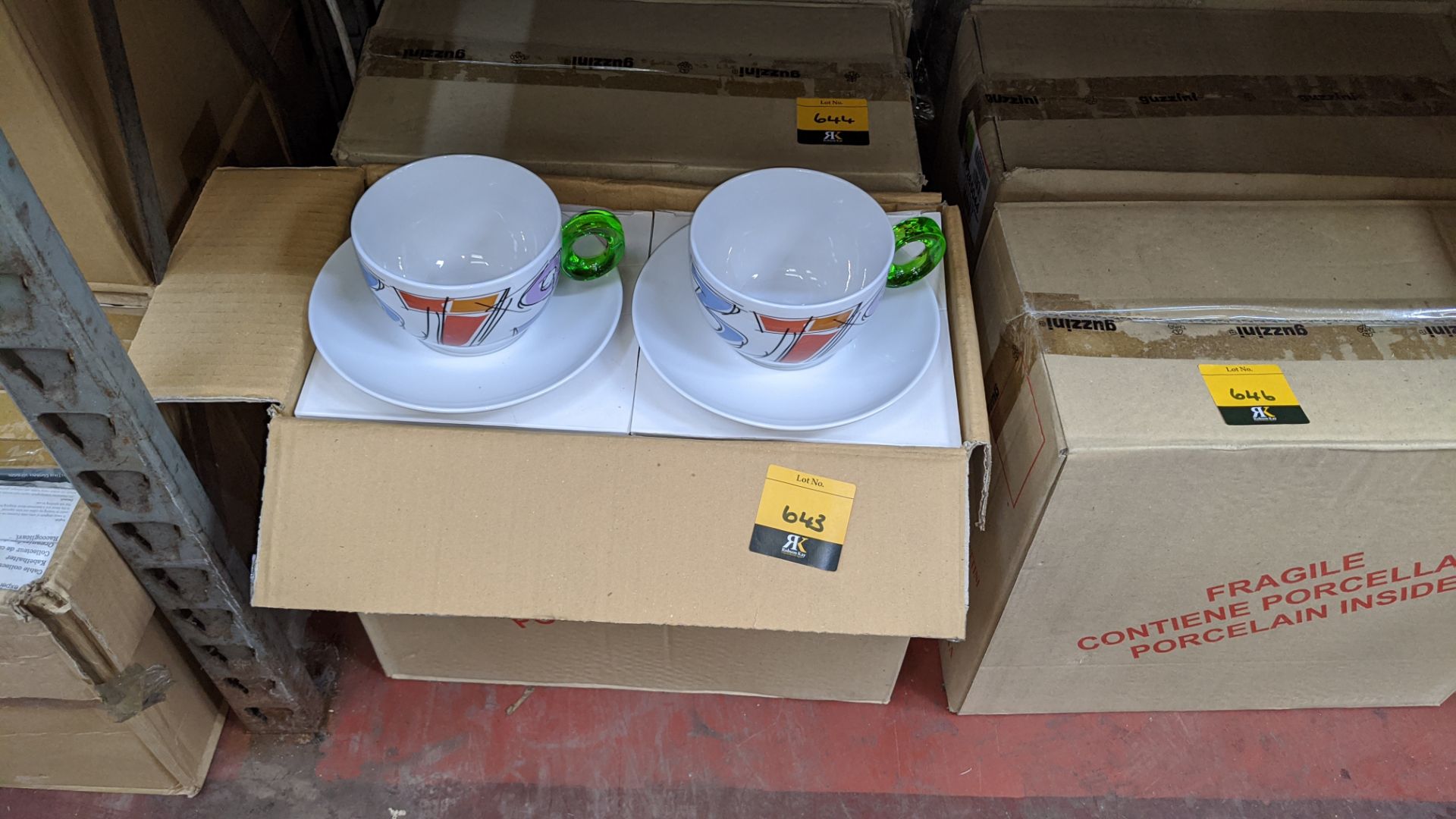 8 off Guzzini porcelain cups & saucers, with green clear handles, boxed in pairs, this lot consists