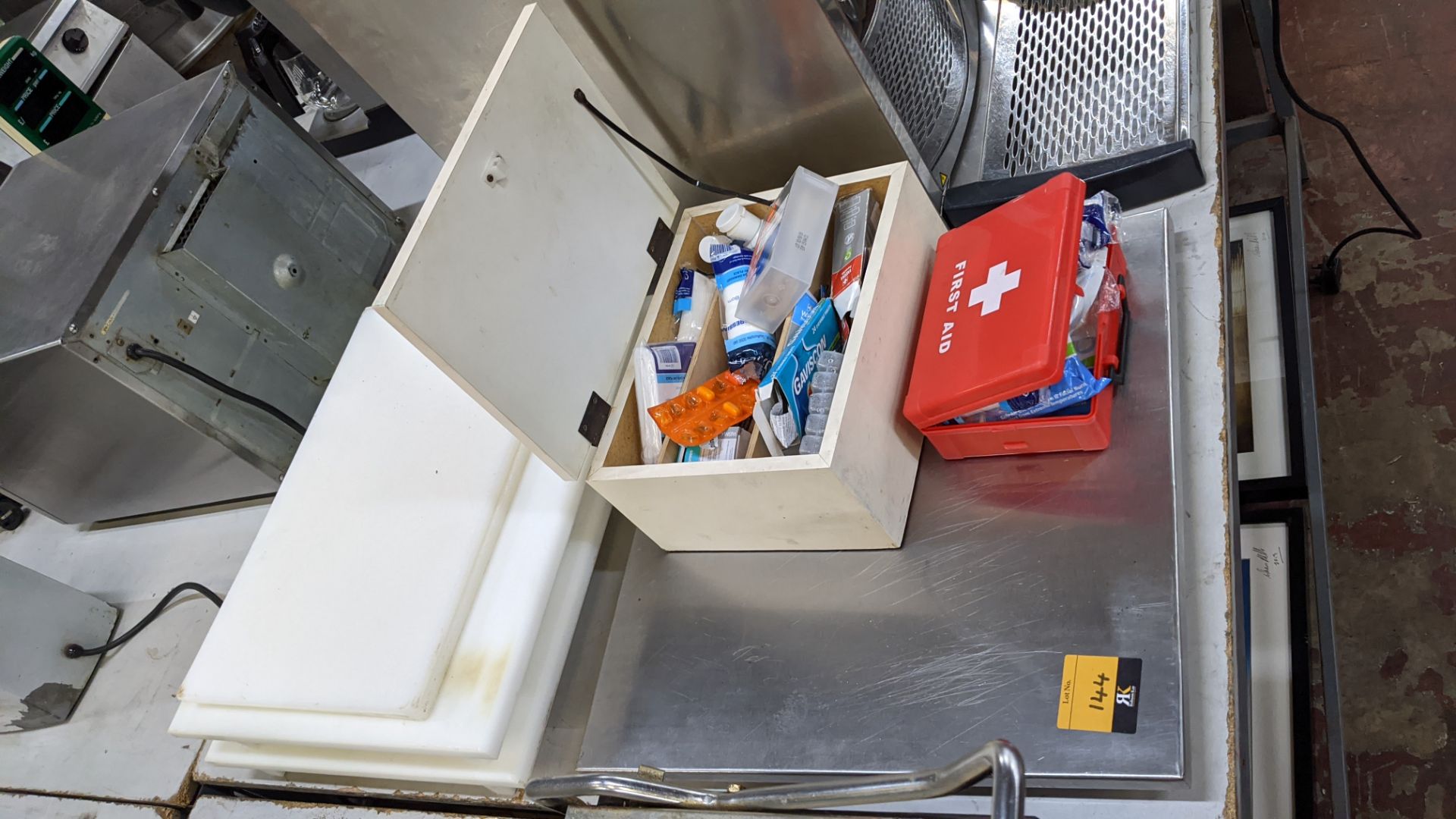 Mixed lot comprising metal square base plus 2 assorted first aid kits & the stack of plastic trays/s