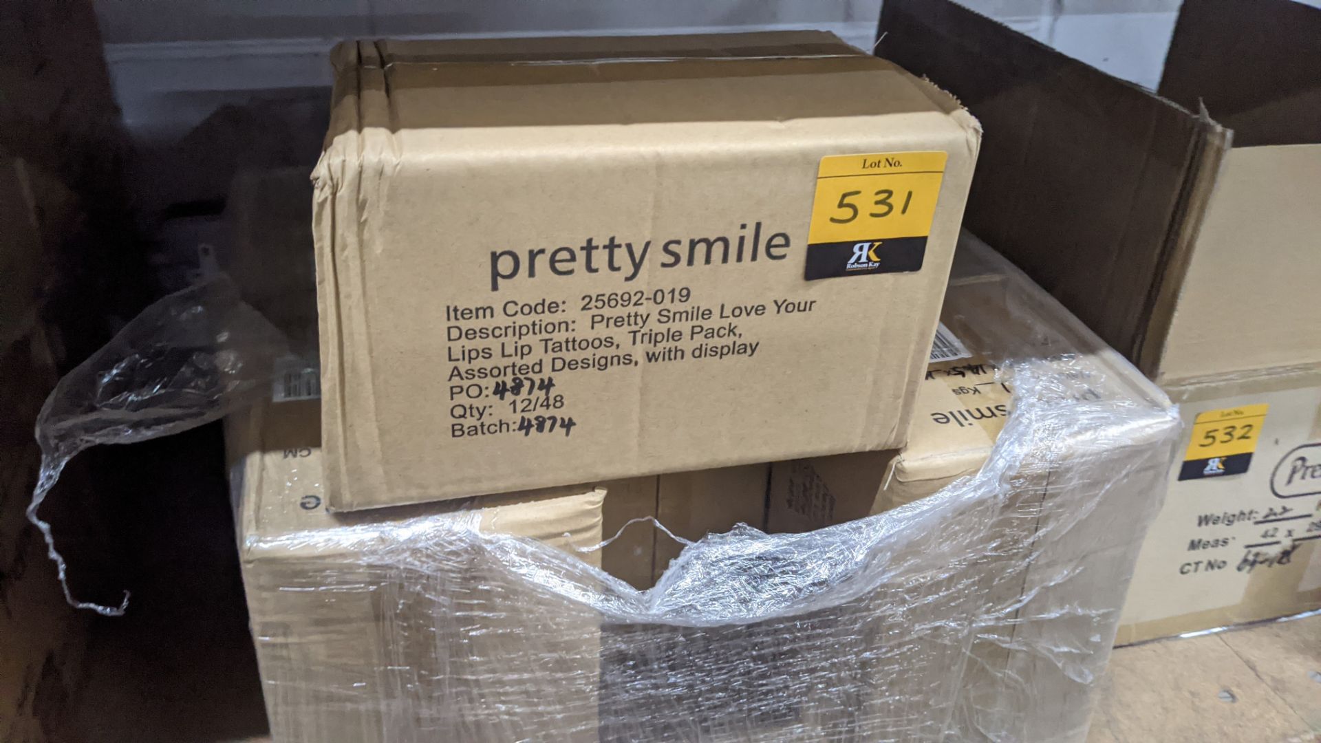 12 boxes of Pretty Smile Love Your Lip tattoos - each carton contains 4 display boxes & each box has